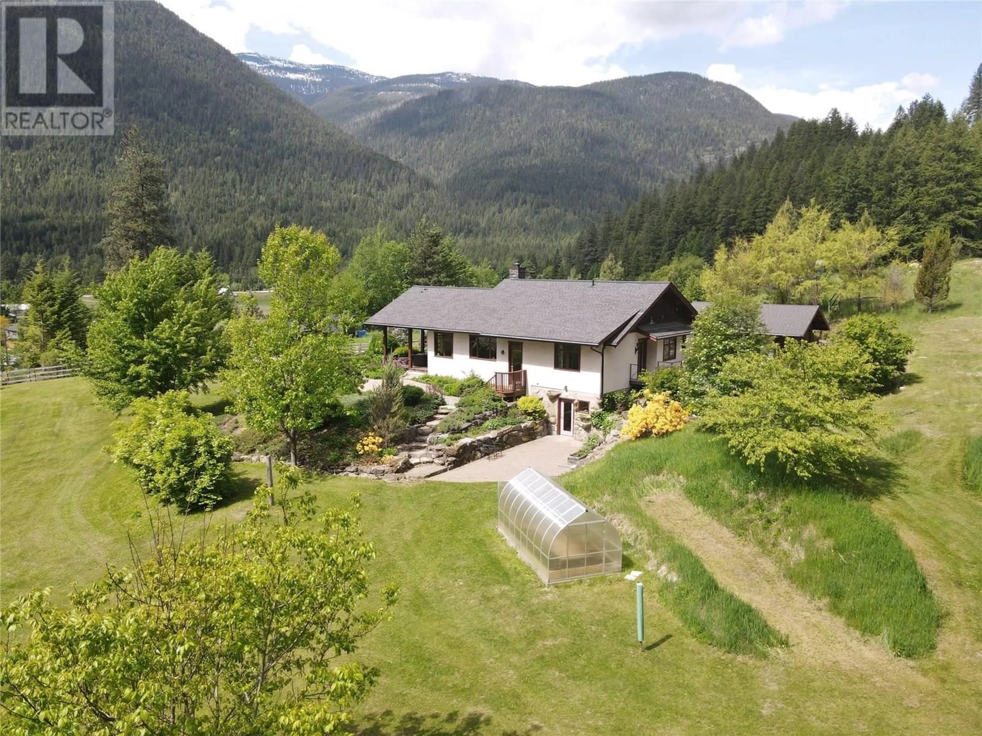 A pic from outside/outdoor area/front of a property/back of a property/a pic from drone, mountain view for 3092 POOHACHOFF ROAD, Slocan Park British Columbia V0G2E0