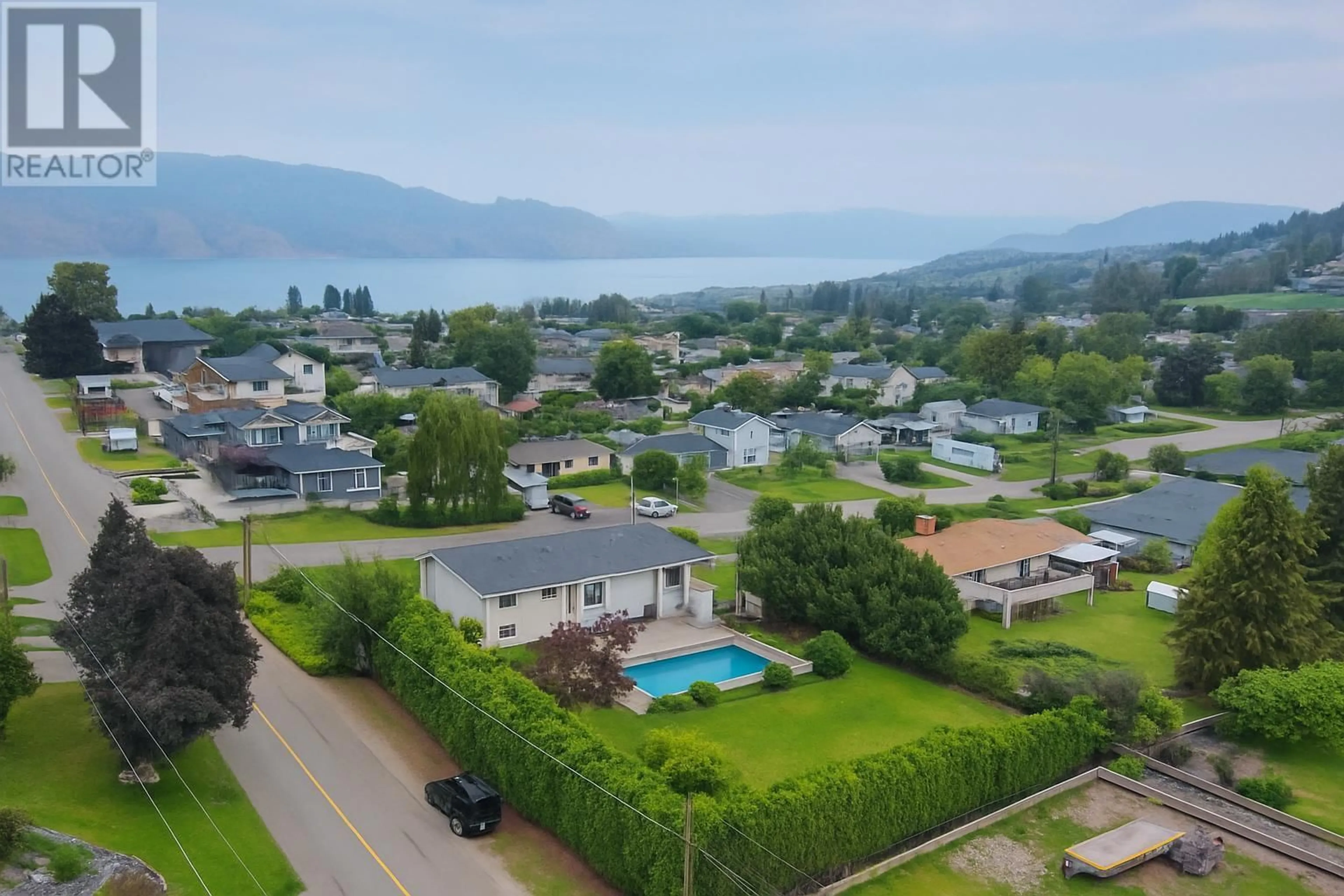 A pic from outside/outdoor area/front of a property/back of a property/a pic from drone, mountain view for 810 WESTBROOK DRIVE, West Kelowna British Columbia V1Z1R3