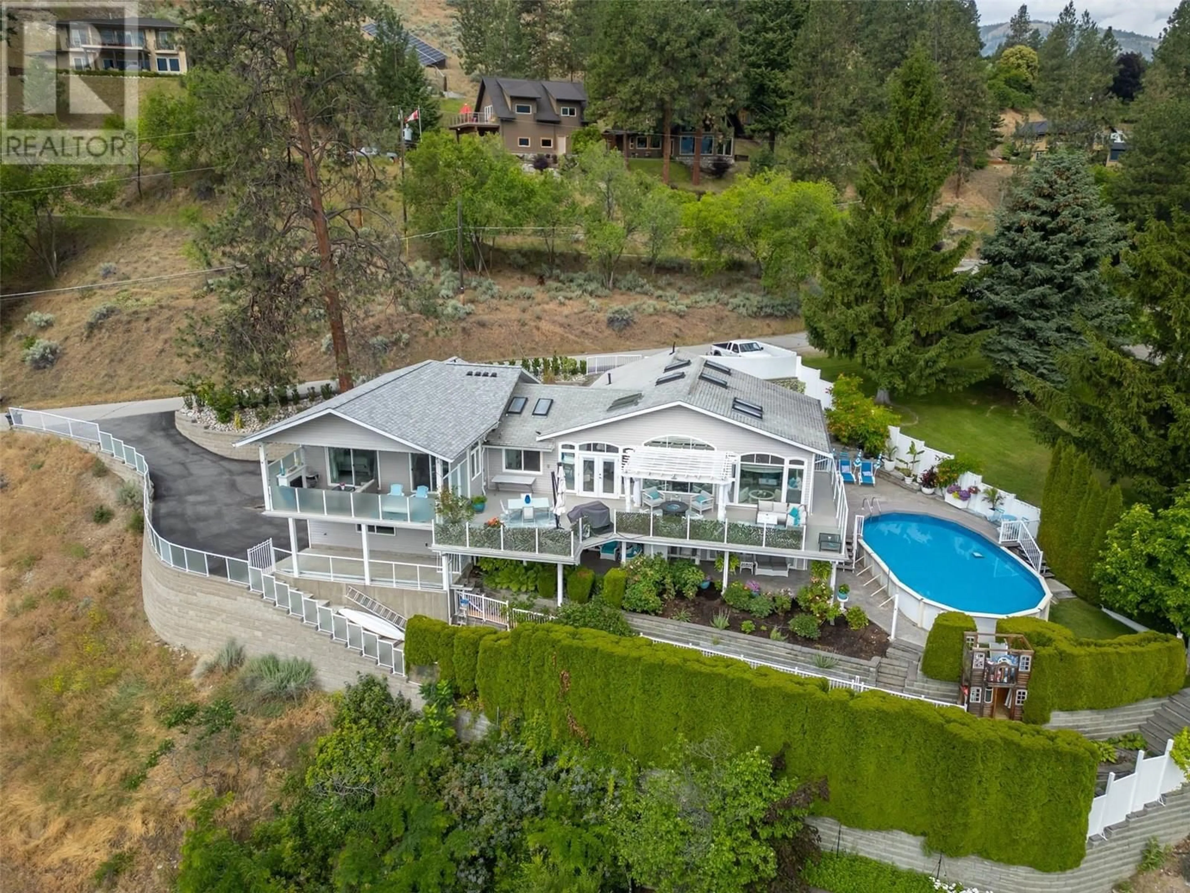 A pic from outside/outdoor area/front of a property/back of a property/a pic from drone, mountain view for 191 OAK AVENUE, Kaleden British Columbia V0H1K0