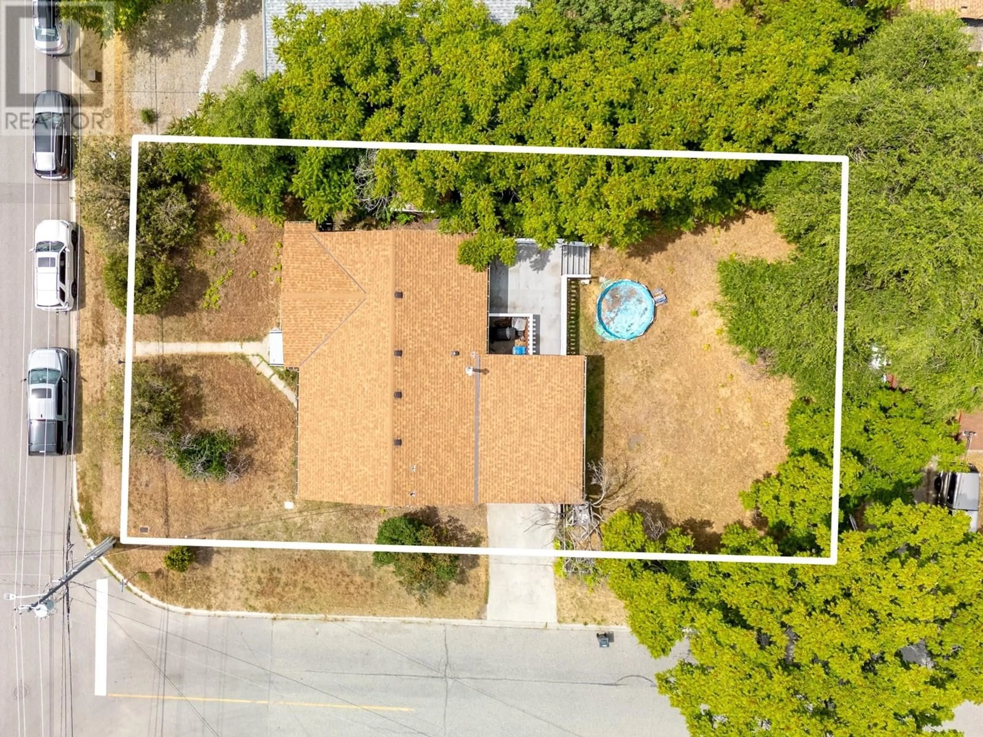 A pic from outside/outdoor area/front of a property/back of a property/a pic from drone, street for 233 GRANBY AVENUE, Penticton British Columbia V2A2Z2