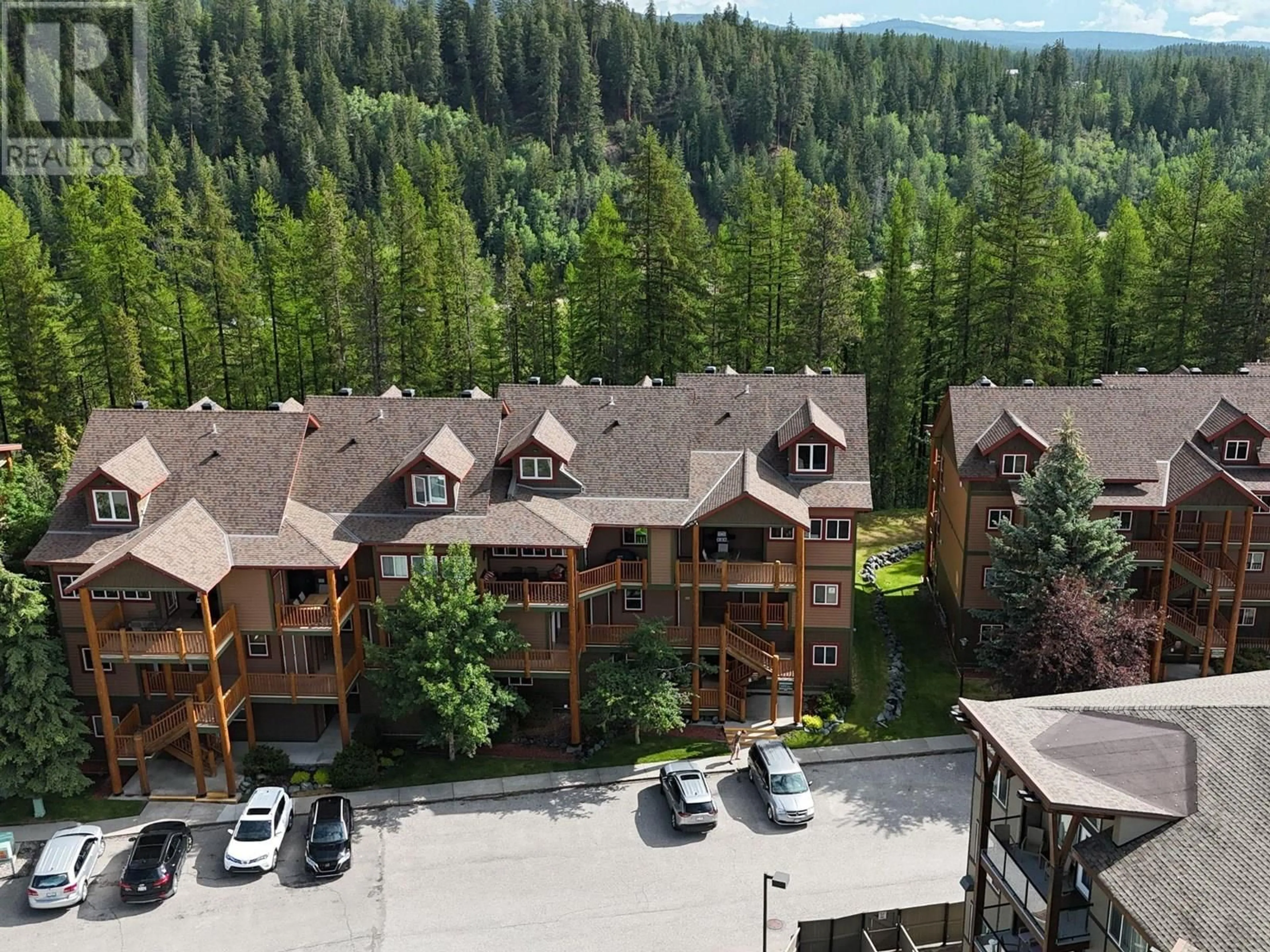 A pic from outside/outdoor area/front of a property/back of a property/a pic from drone, mountain view for 301 - 300 STEMWINDER DRIVE, Kimberley British Columbia V1A3E9