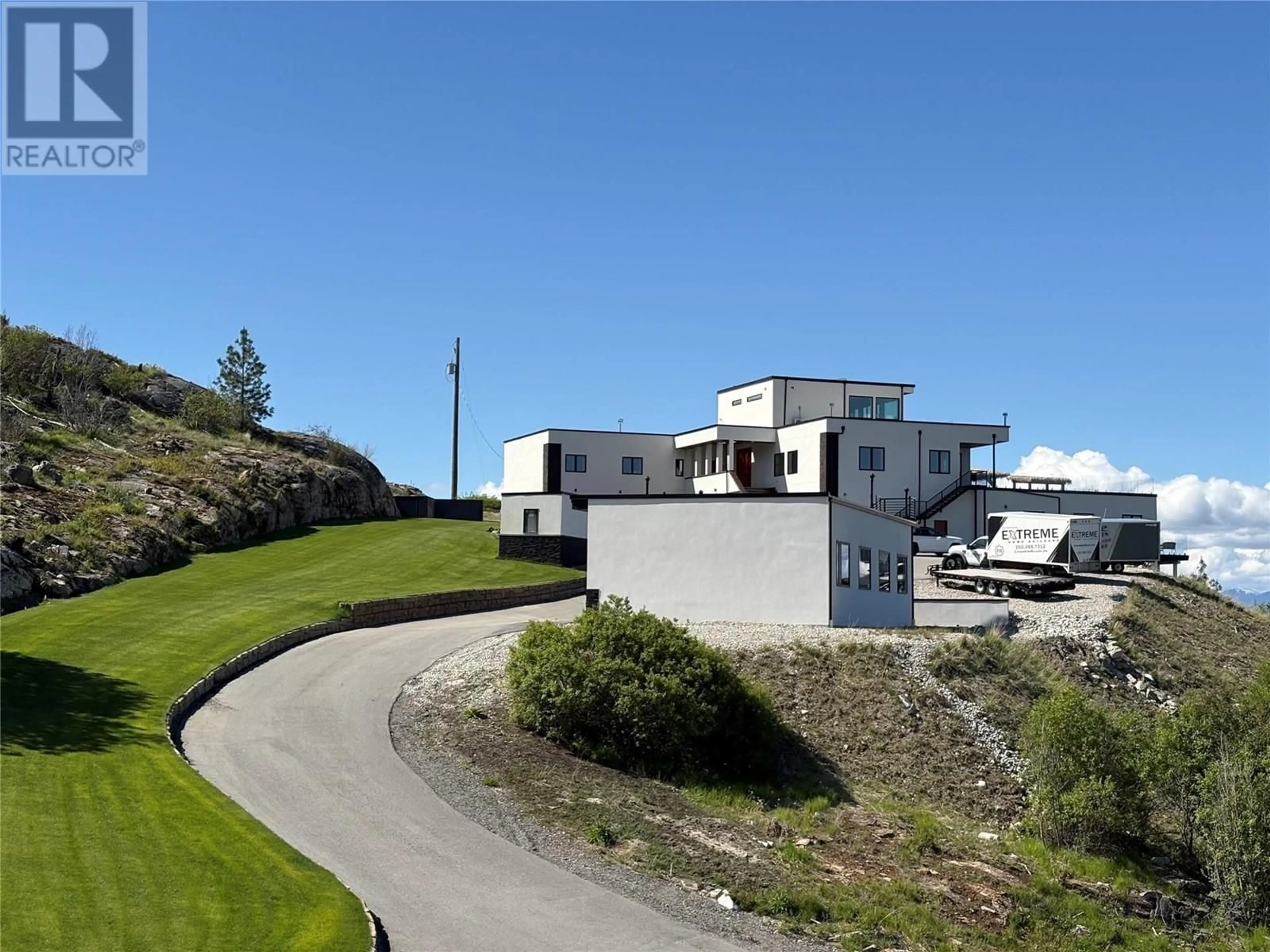 A pic from outside/outdoor area/front of a property/back of a property/a pic from drone, unknown for 148 GARNET WAY, Penticton British Columbia V2A8V9