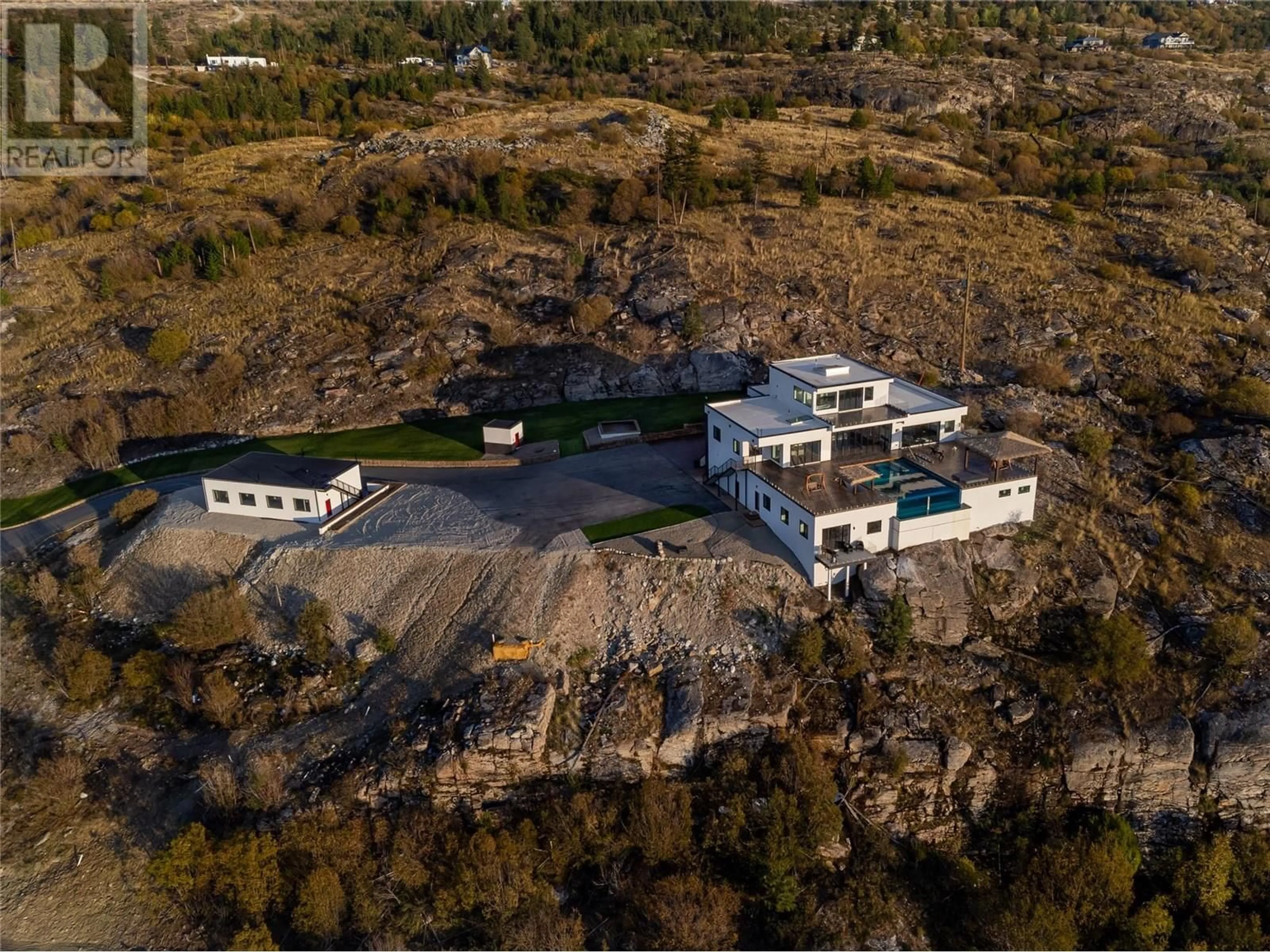 A pic from outside/outdoor area/front of a property/back of a property/a pic from drone, mountain view for 148 GARNET WAY, Penticton British Columbia V2A8V9