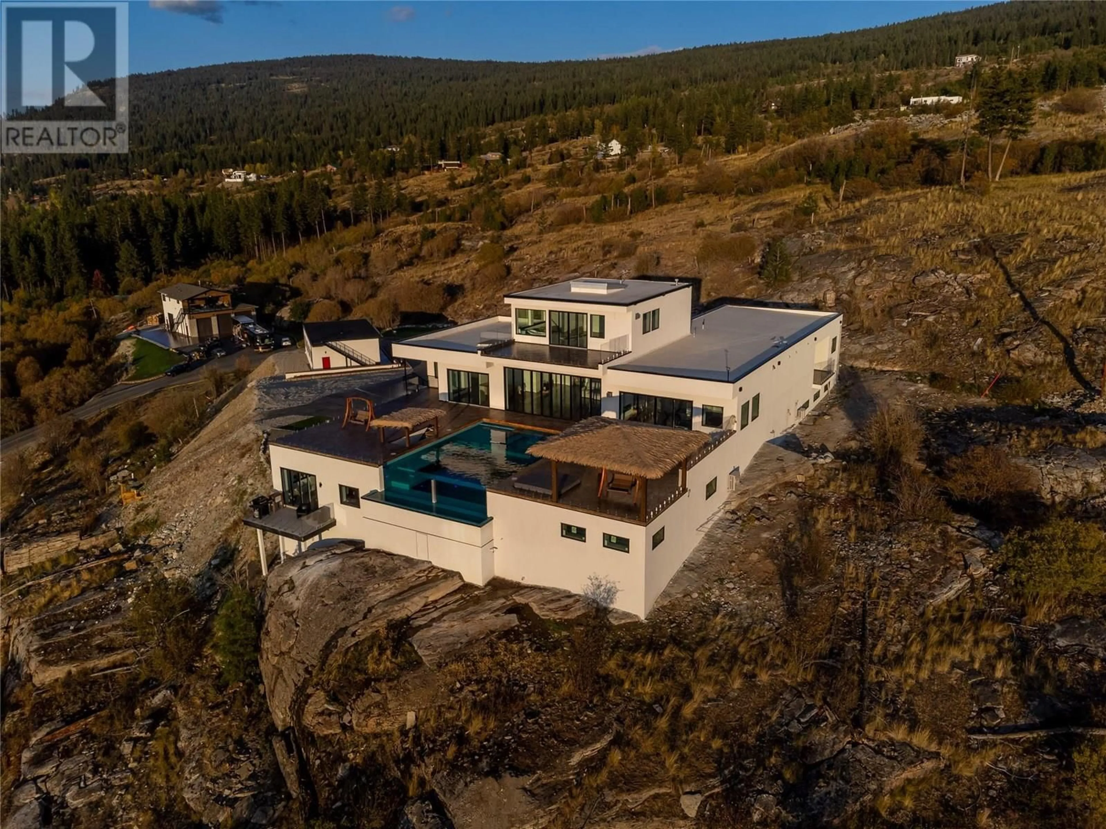 A pic from outside/outdoor area/front of a property/back of a property/a pic from drone, mountain view for 148 GARNET WAY, Penticton British Columbia V2A8V9
