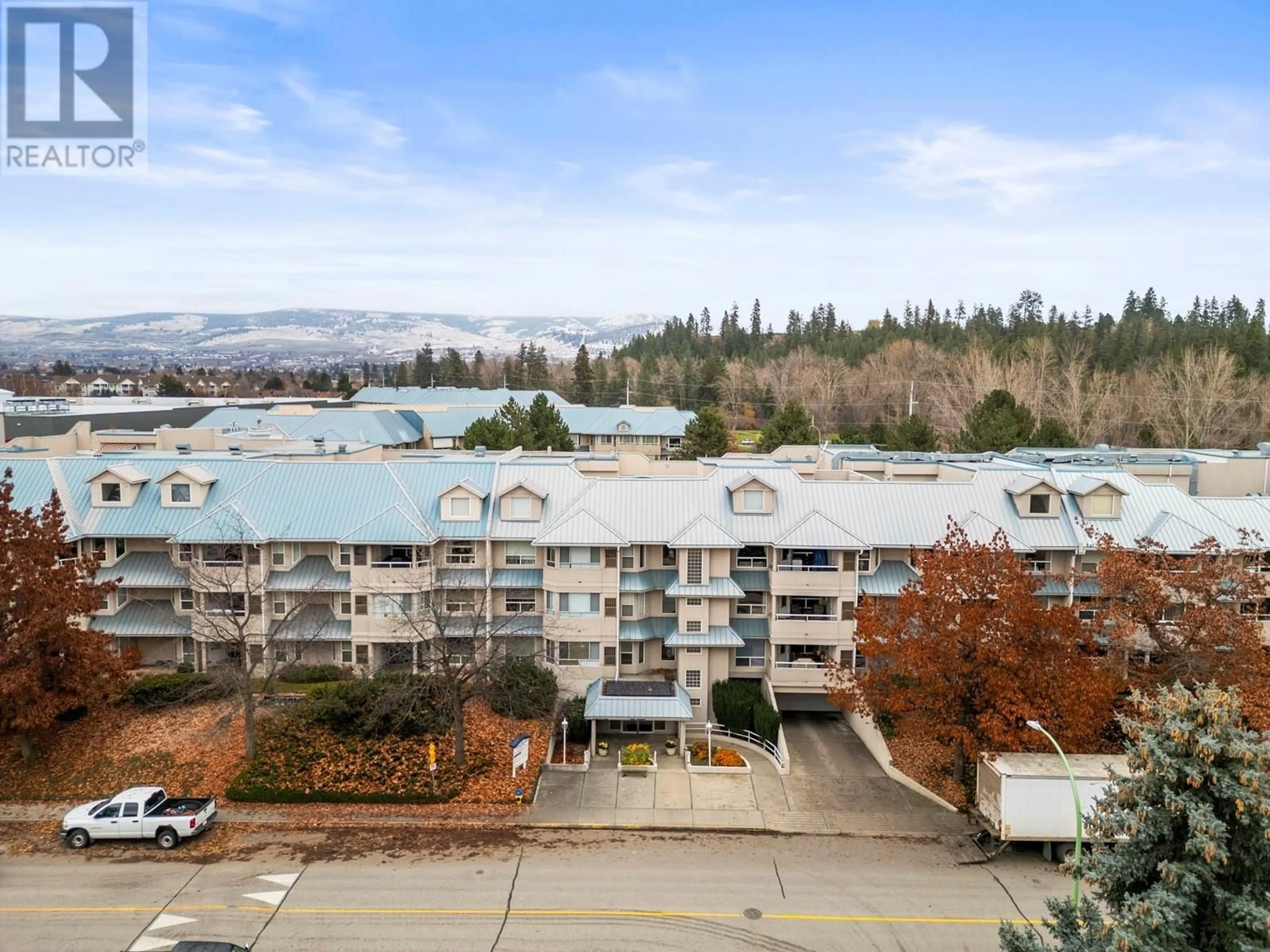 A pic from outside/outdoor area/front of a property/back of a property/a pic from drone, mountain view for 307 - 1965 DURNIN ROAD, Kelowna British Columbia V1X7K6