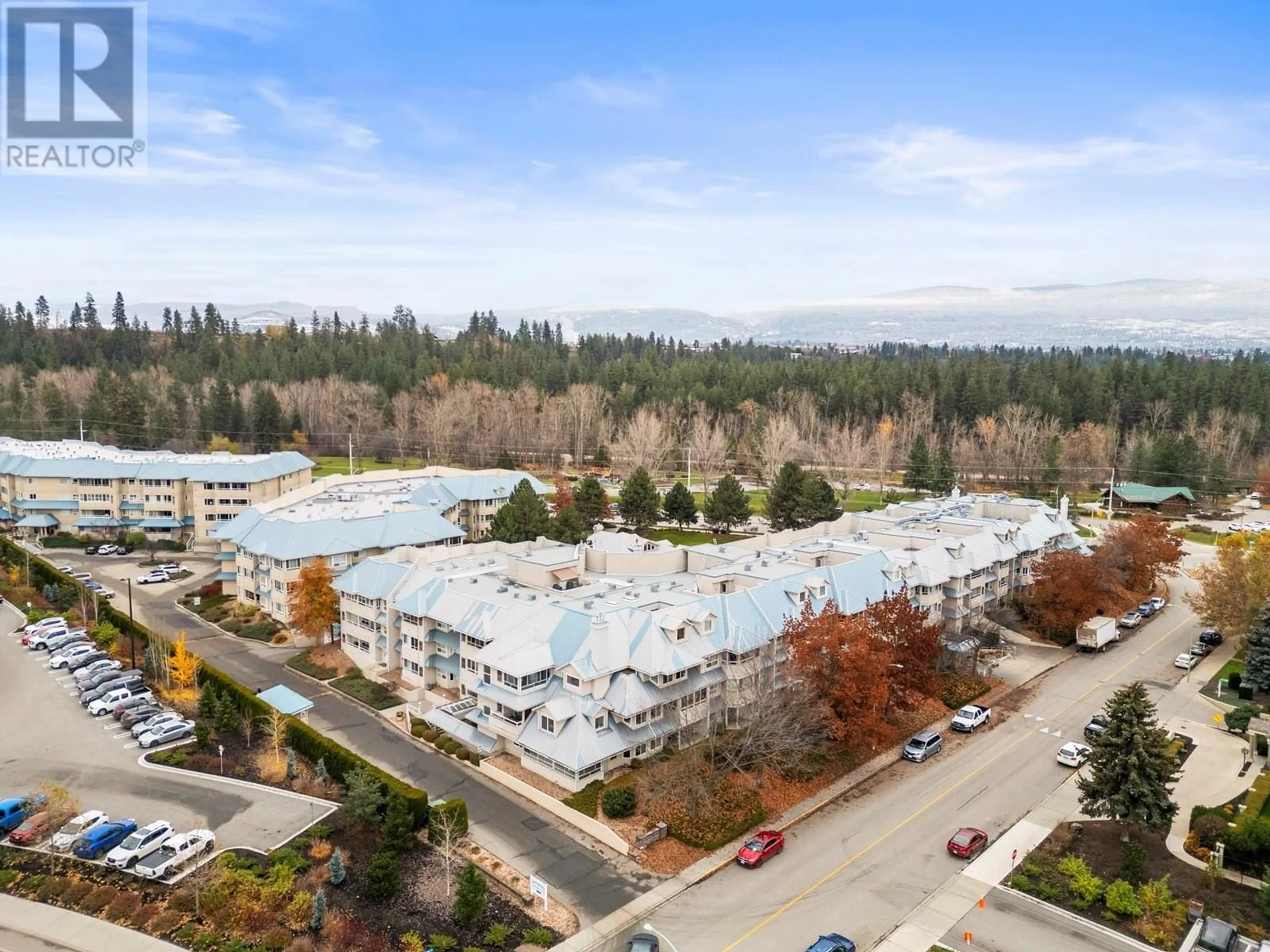 A pic from outside/outdoor area/front of a property/back of a property/a pic from drone, mountain view for 307 - 1965 DURNIN ROAD, Kelowna British Columbia V1X7K6