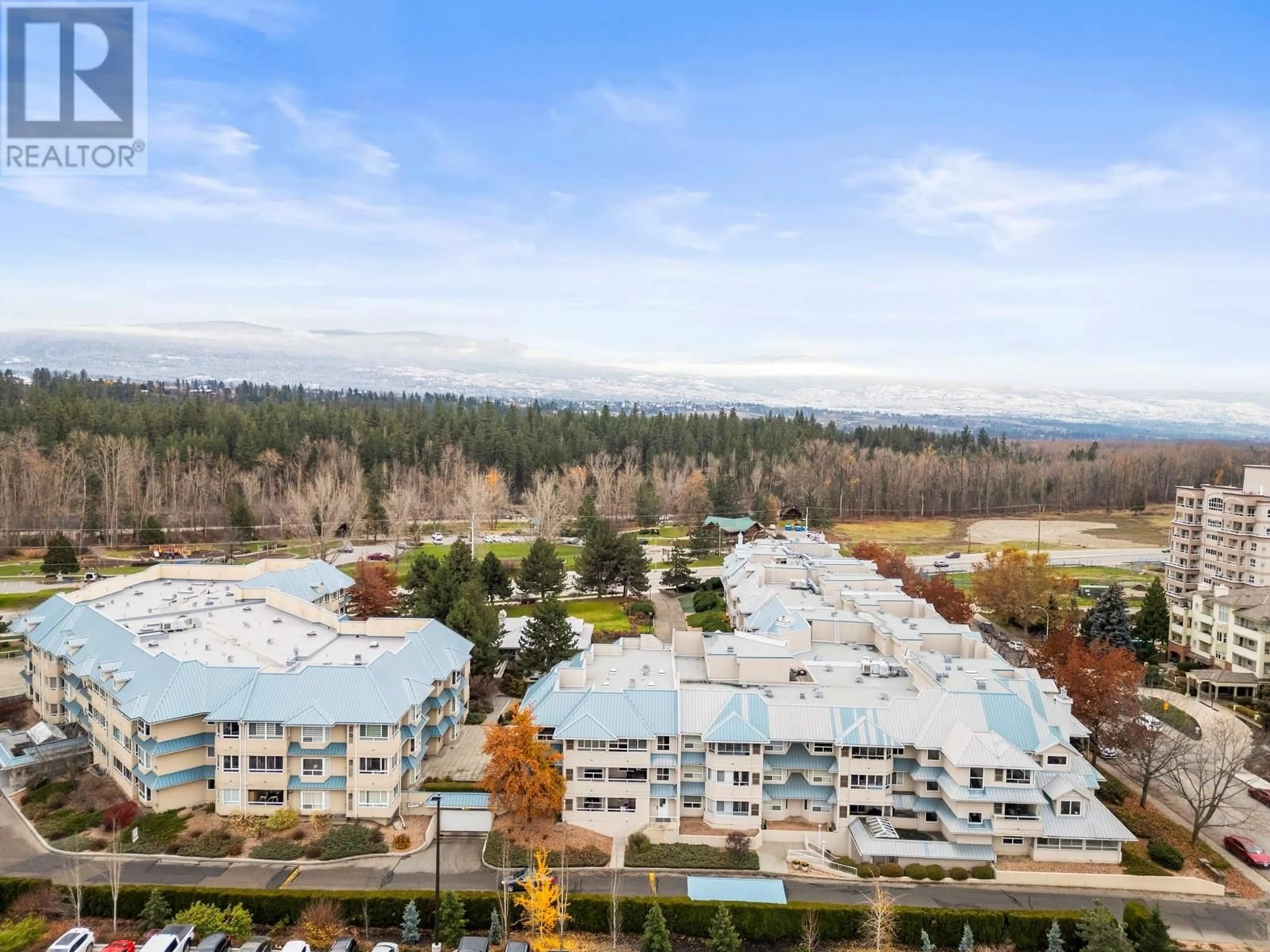 A pic from outside/outdoor area/front of a property/back of a property/a pic from drone, mountain view for 307 - 1965 DURNIN ROAD, Kelowna British Columbia V1X7K6