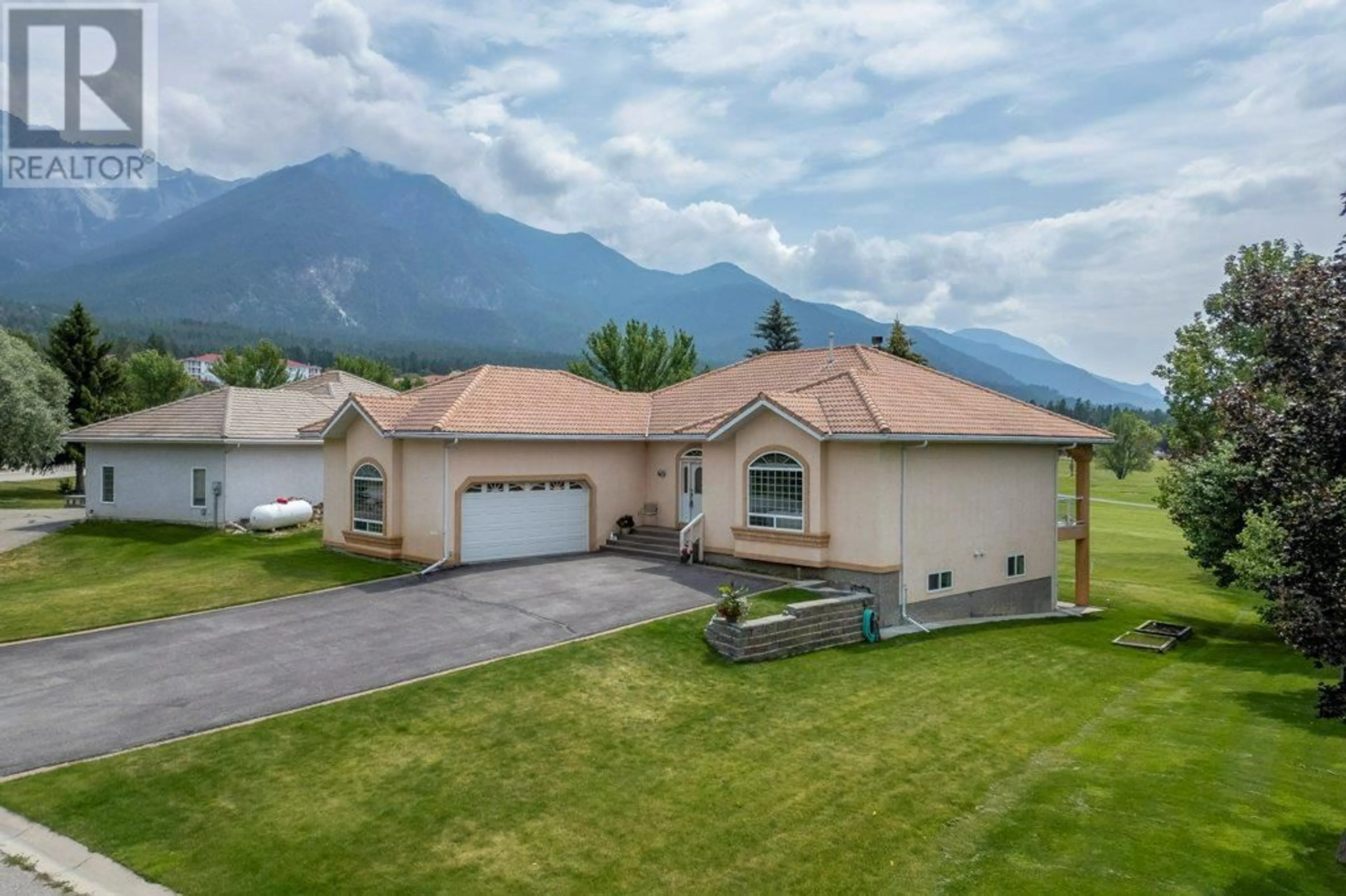 A pic from outside/outdoor area/front of a property/back of a property/a pic from drone, mountain view for 4866 GLEN EAGLE DRIVE, Fairmont Hot Springs British Columbia V0B1L1