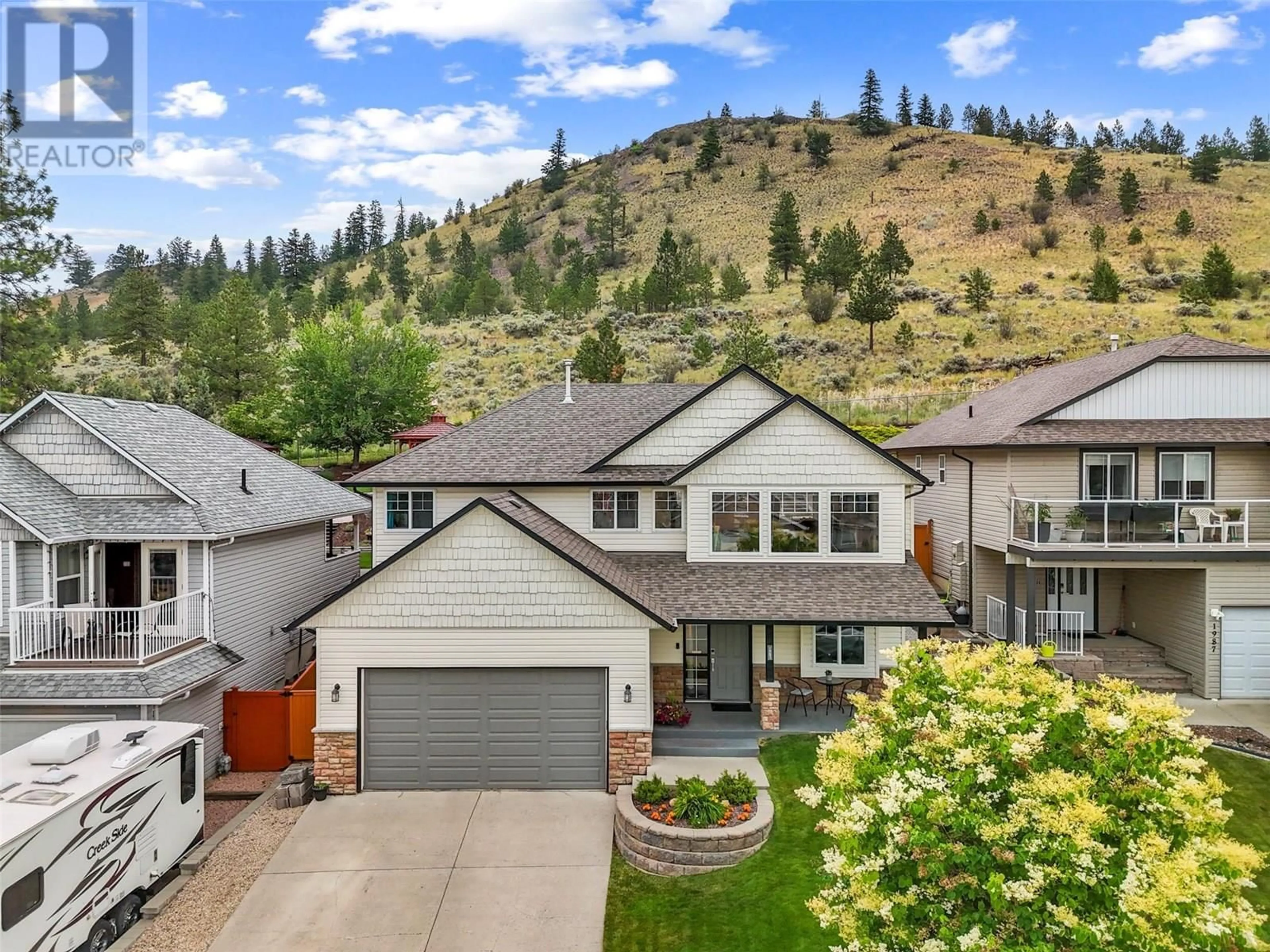A pic from outside/outdoor area/front of a property/back of a property/a pic from drone, mountain view for 1983 SASKATOON PLACE, Kamloops British Columbia V2E2T1