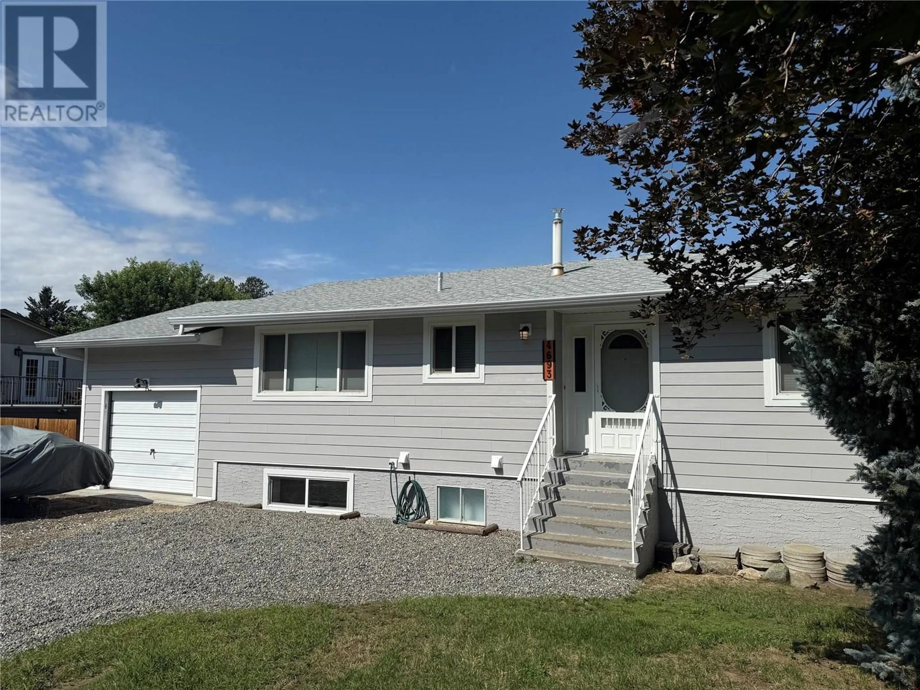 Home with vinyl exterior material, street for 4693 SPURRAWAY ROAD, Kamloops British Columbia V2H1M7