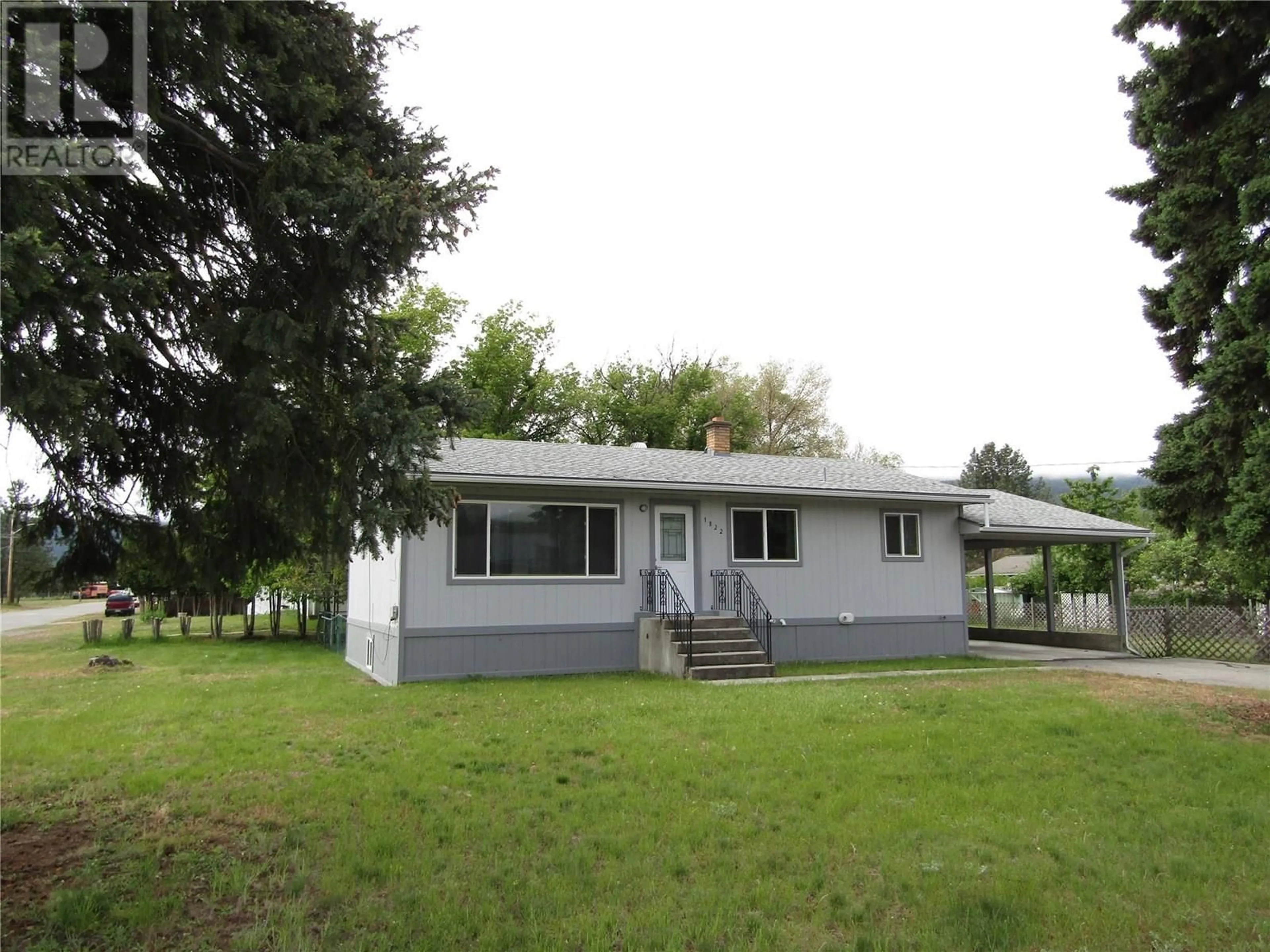 Home with vinyl exterior material, street for 1822 66 AVENUE, Grand Forks British Columbia V0H1H2