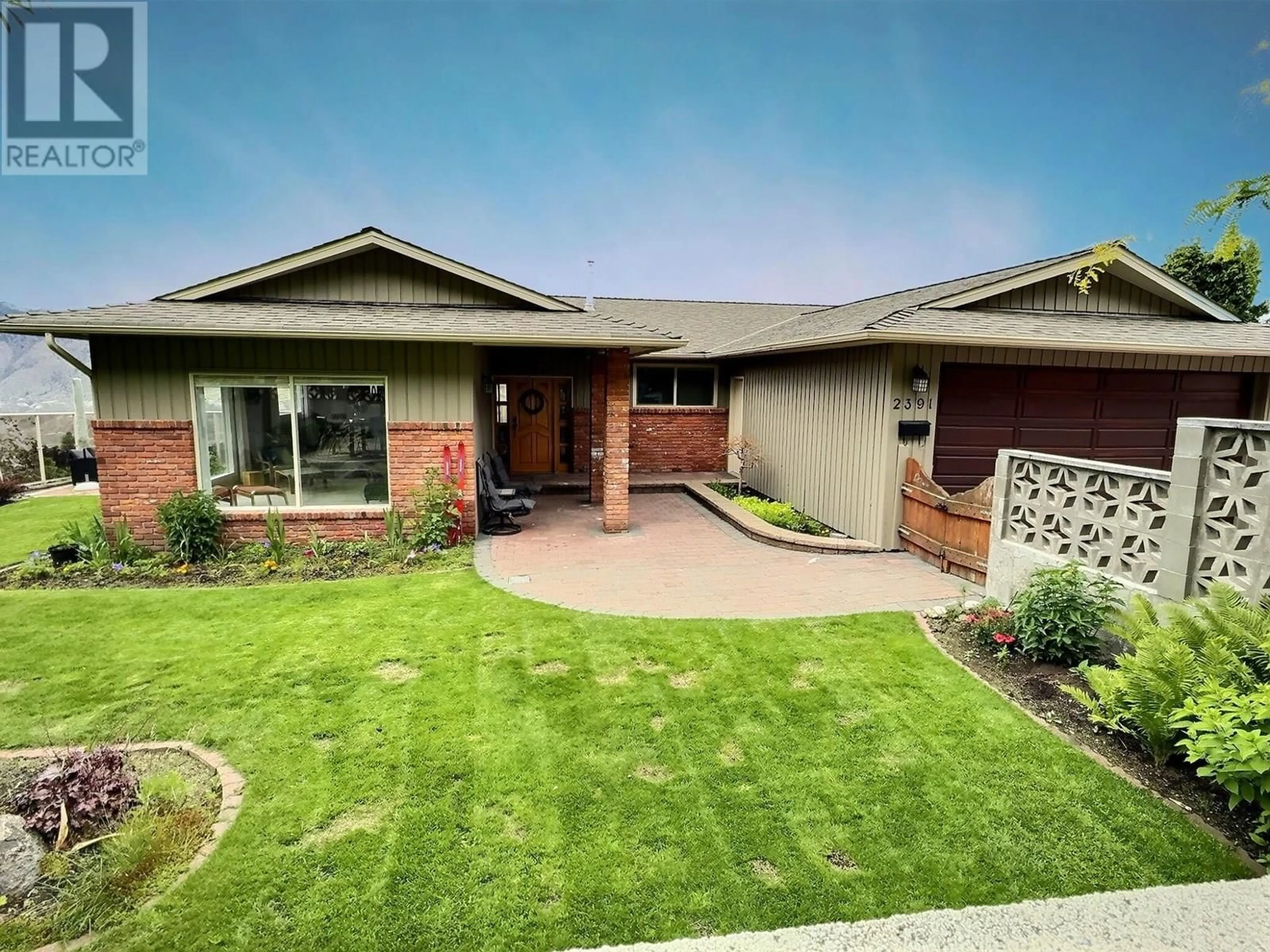 A pic from outside/outdoor area/front of a property/back of a property/a pic from drone, street for 2391 SKEENA DRIVE, Kamloops British Columbia V2E1Y2