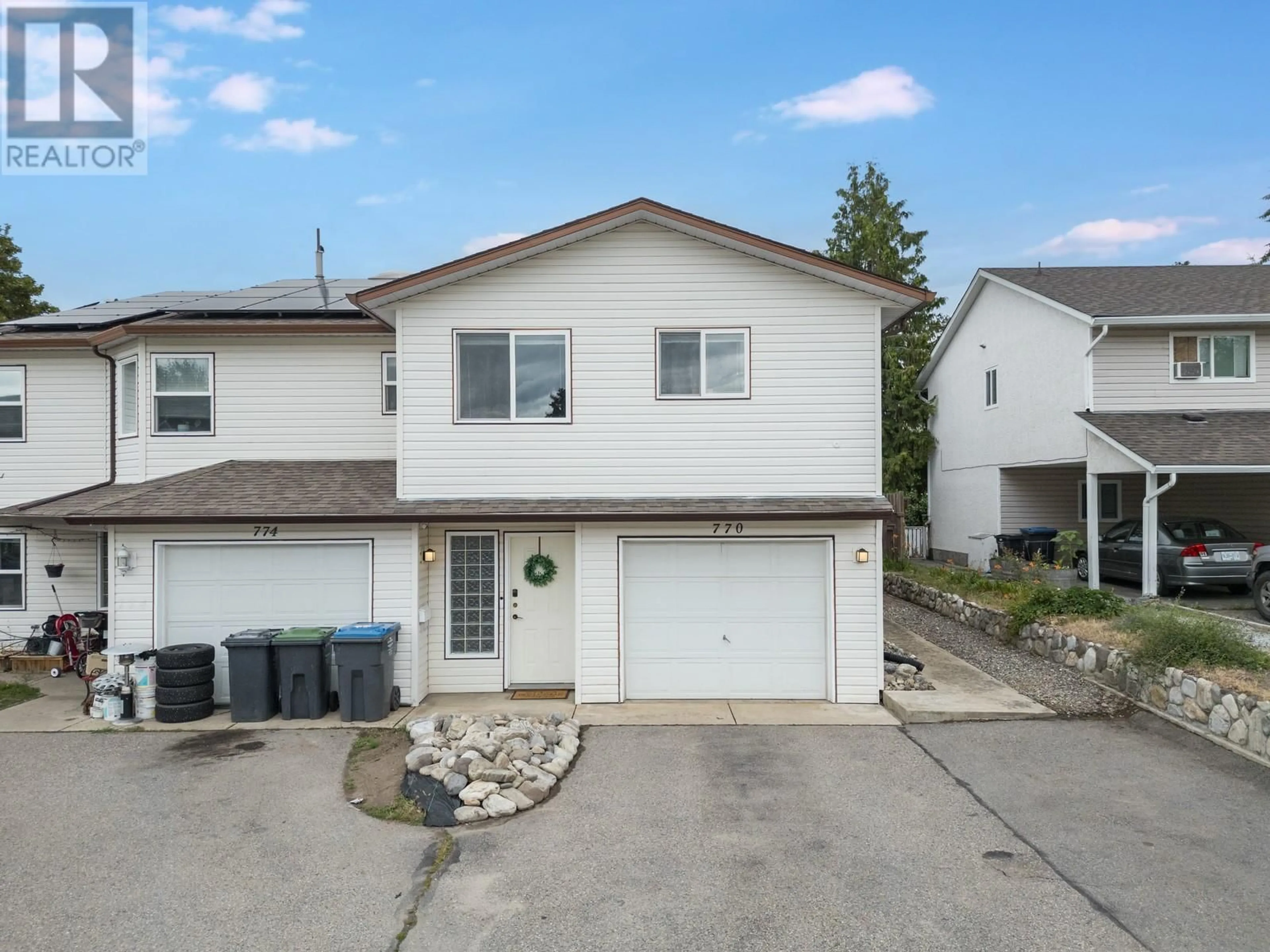 A pic from outside/outdoor area/front of a property/back of a property/a pic from drone, street for 770 WHITE COURT, Kelowna British Columbia V1X7C3