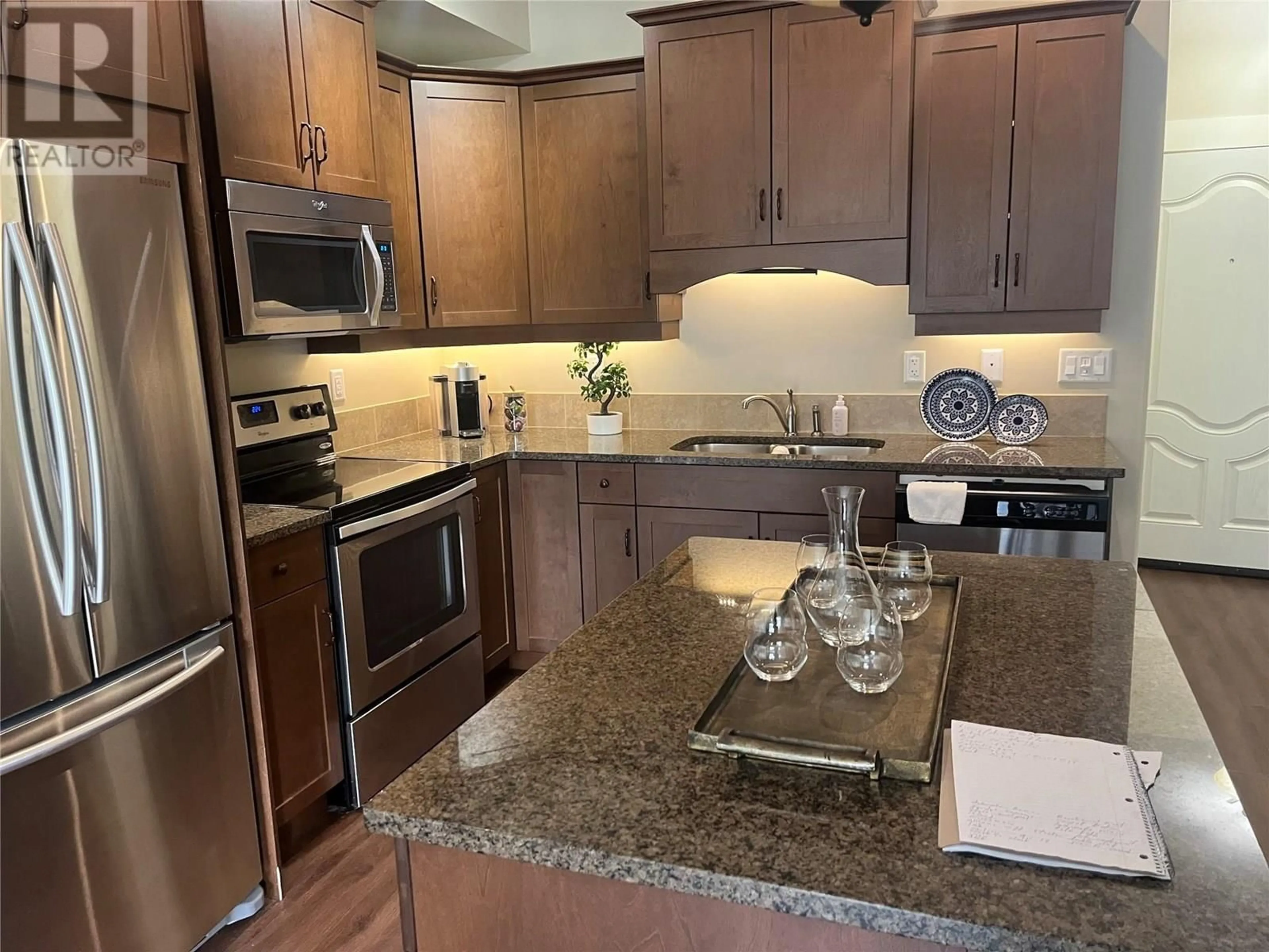Open concept kitchen, ceramic/tile floor for 407 - 755 MCGILL ROAD, Kamloops British Columbia V2C0B6