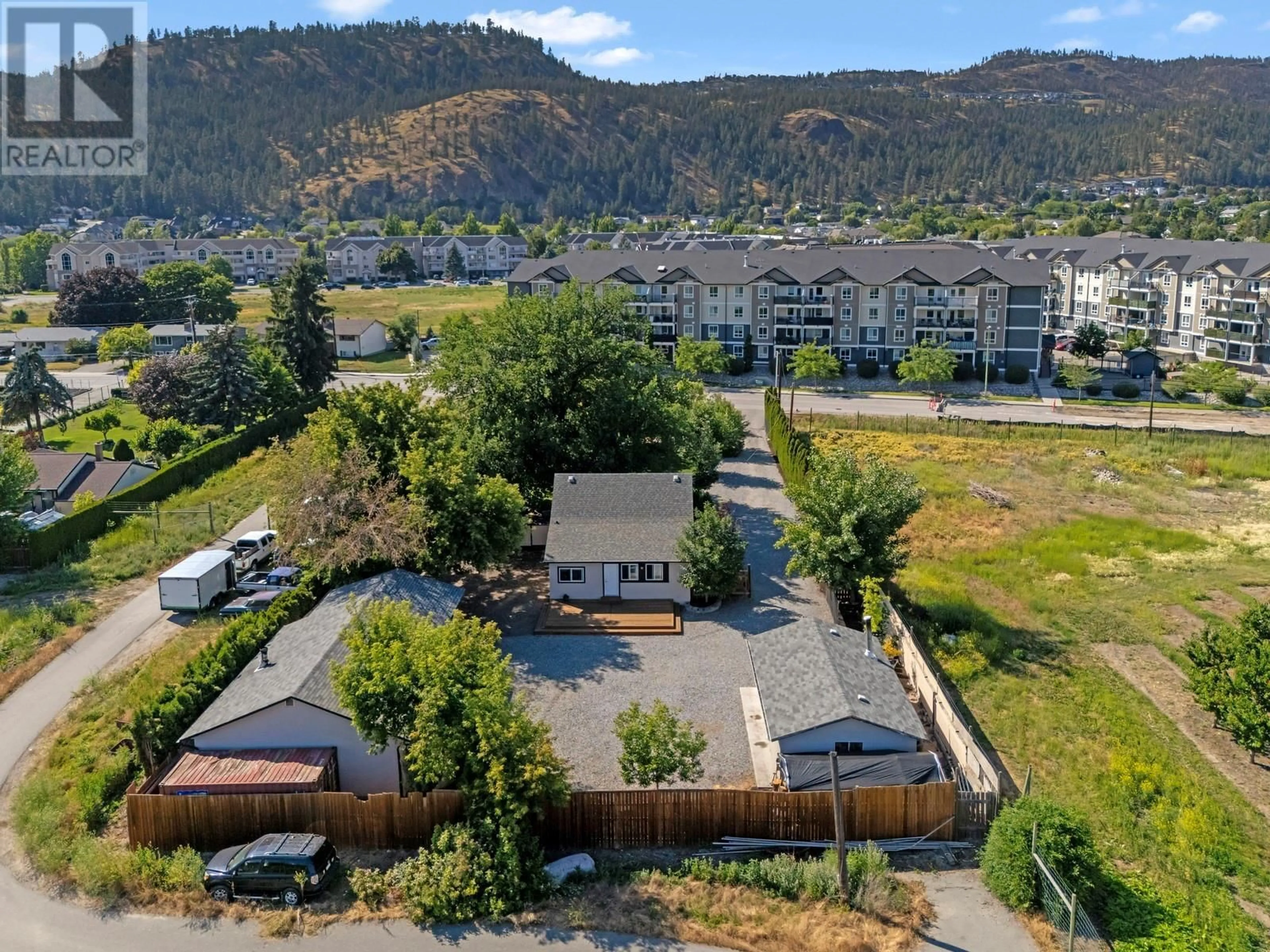 A pic from outside/outdoor area/front of a property/back of a property/a pic from drone, mountain view for 431 VALLEY ROAD, Kelowna British Columbia V1V2E5