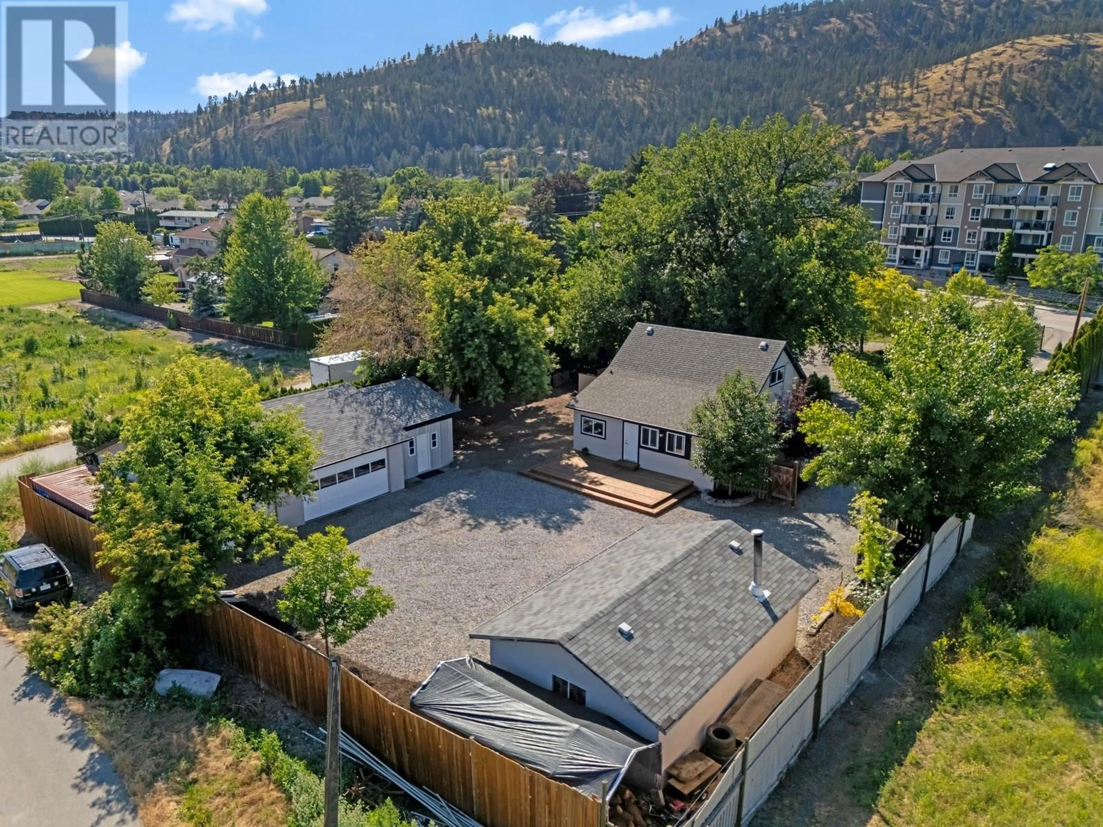 A pic from outside/outdoor area/front of a property/back of a property/a pic from drone, mountain view for 431 VALLEY ROAD, Kelowna British Columbia V1V2E5