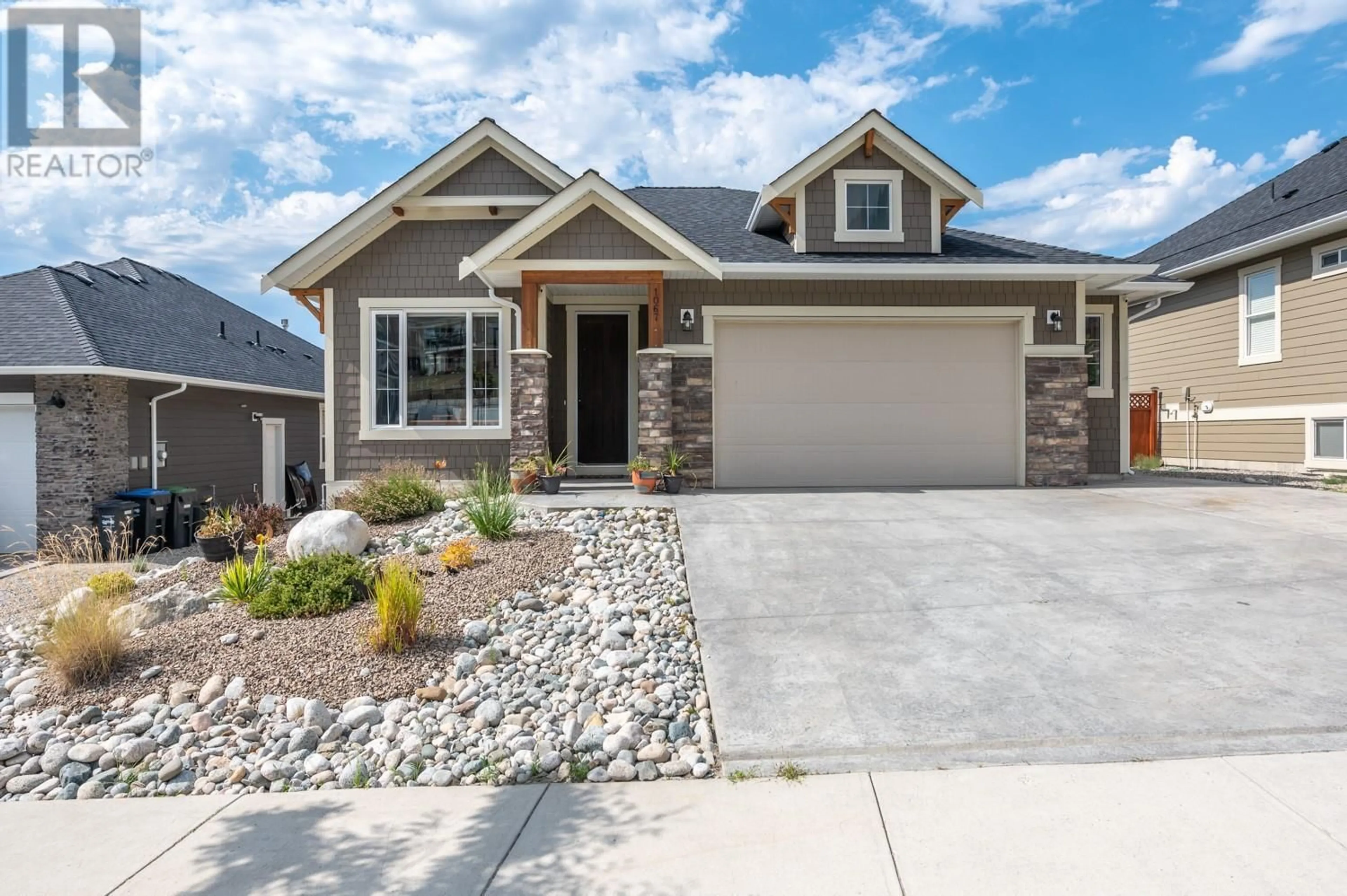Home with brick exterior material, street for 1067 HOLDEN ROAD, Penticton British Columbia V2A0B7