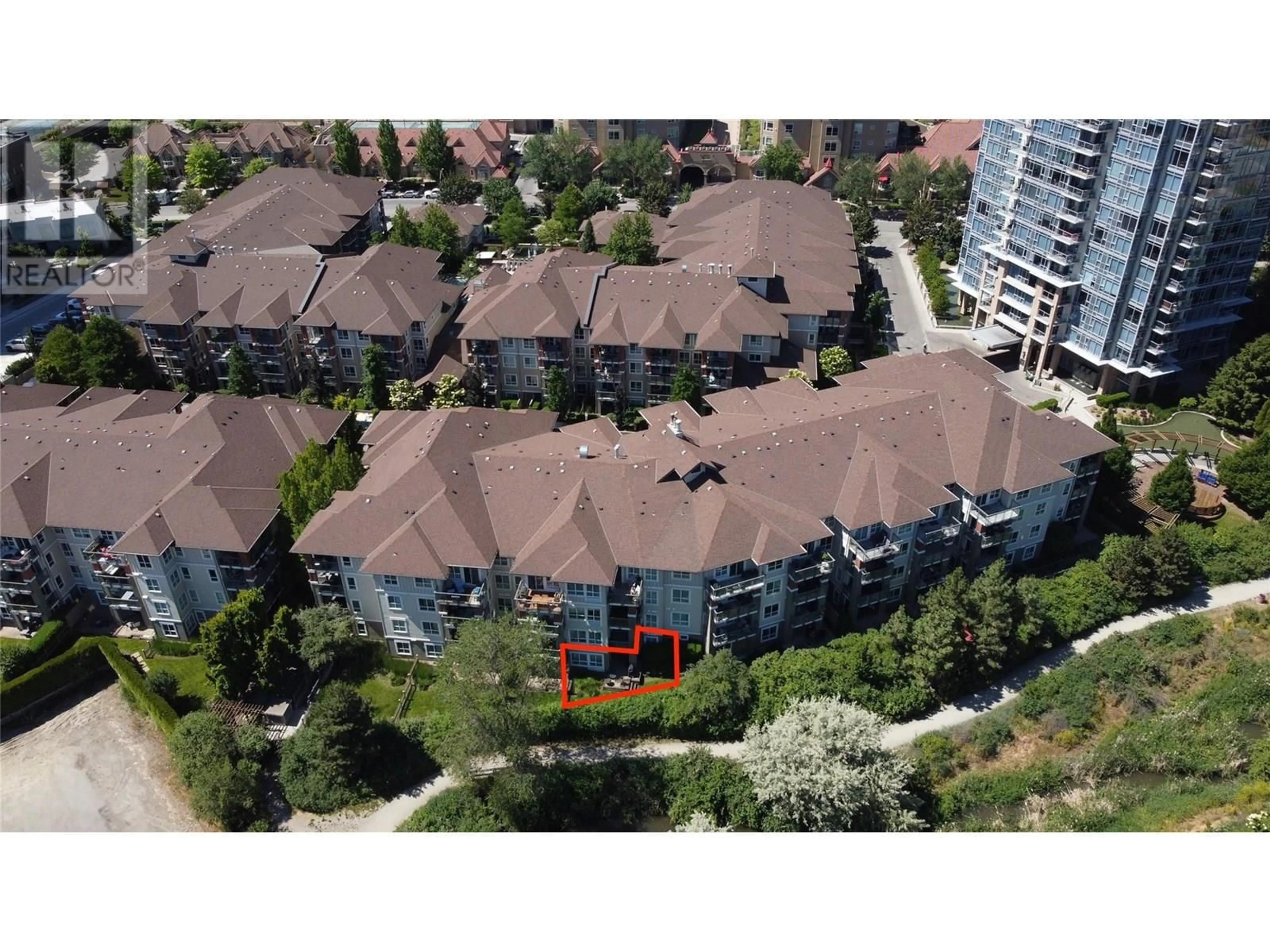 A pic from outside/outdoor area/front of a property/back of a property/a pic from drone, city buildings view from balcony for 112 - 1089 SUNSET DRIVE, Kelowna British Columbia V1Y9Z3