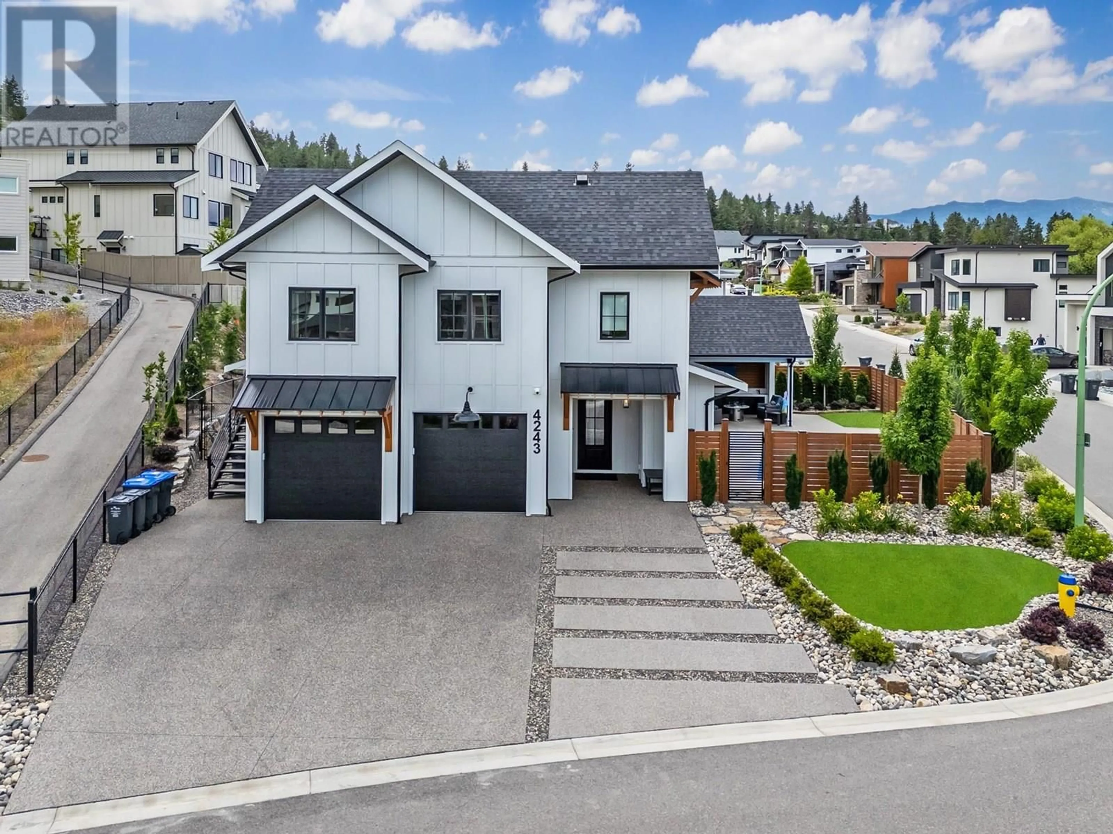 Home with vinyl exterior material, street for 4243 RUSSO STREET, Kelowna British Columbia V1W0C6