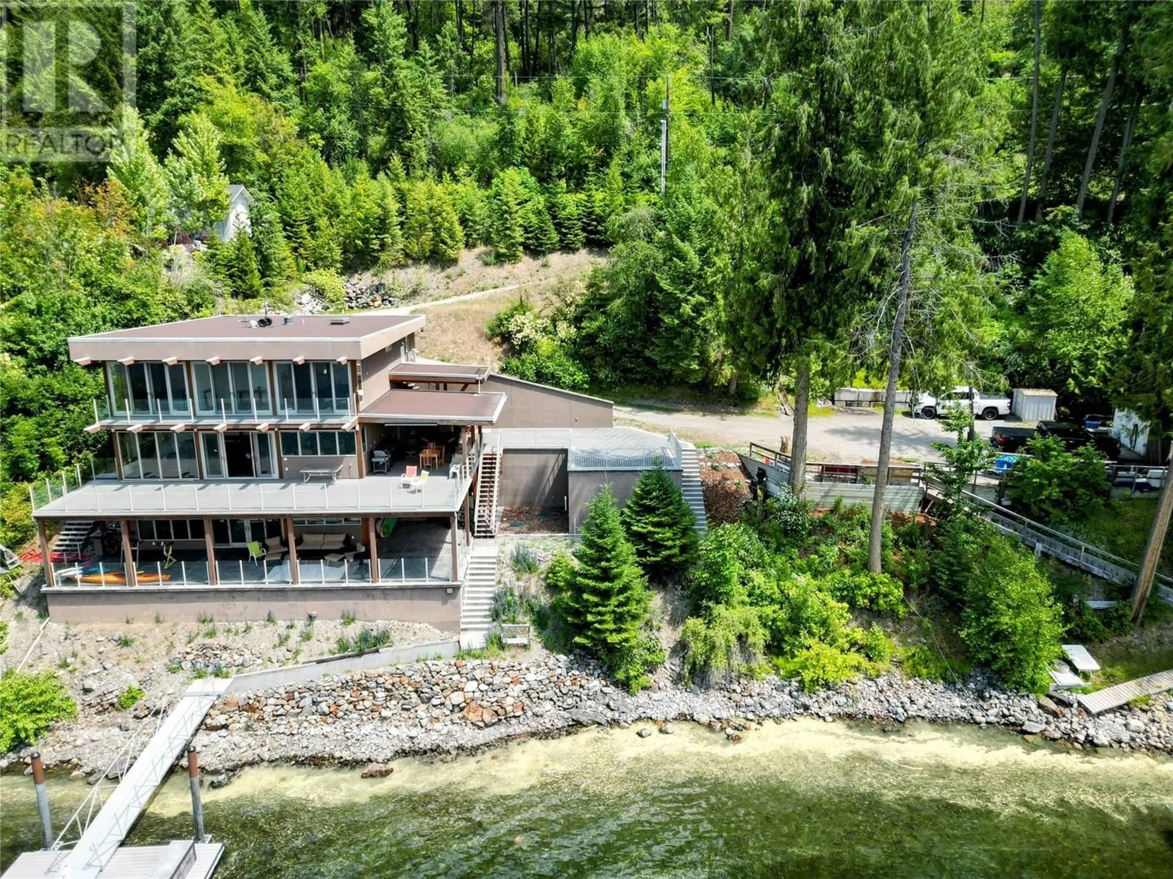 A pic from outside/outdoor area/front of a property/back of a property/a pic from drone, water/lake/river/ocean view for 2411 SUNSET DRIVE, Christina Lake British Columbia V0H1E2