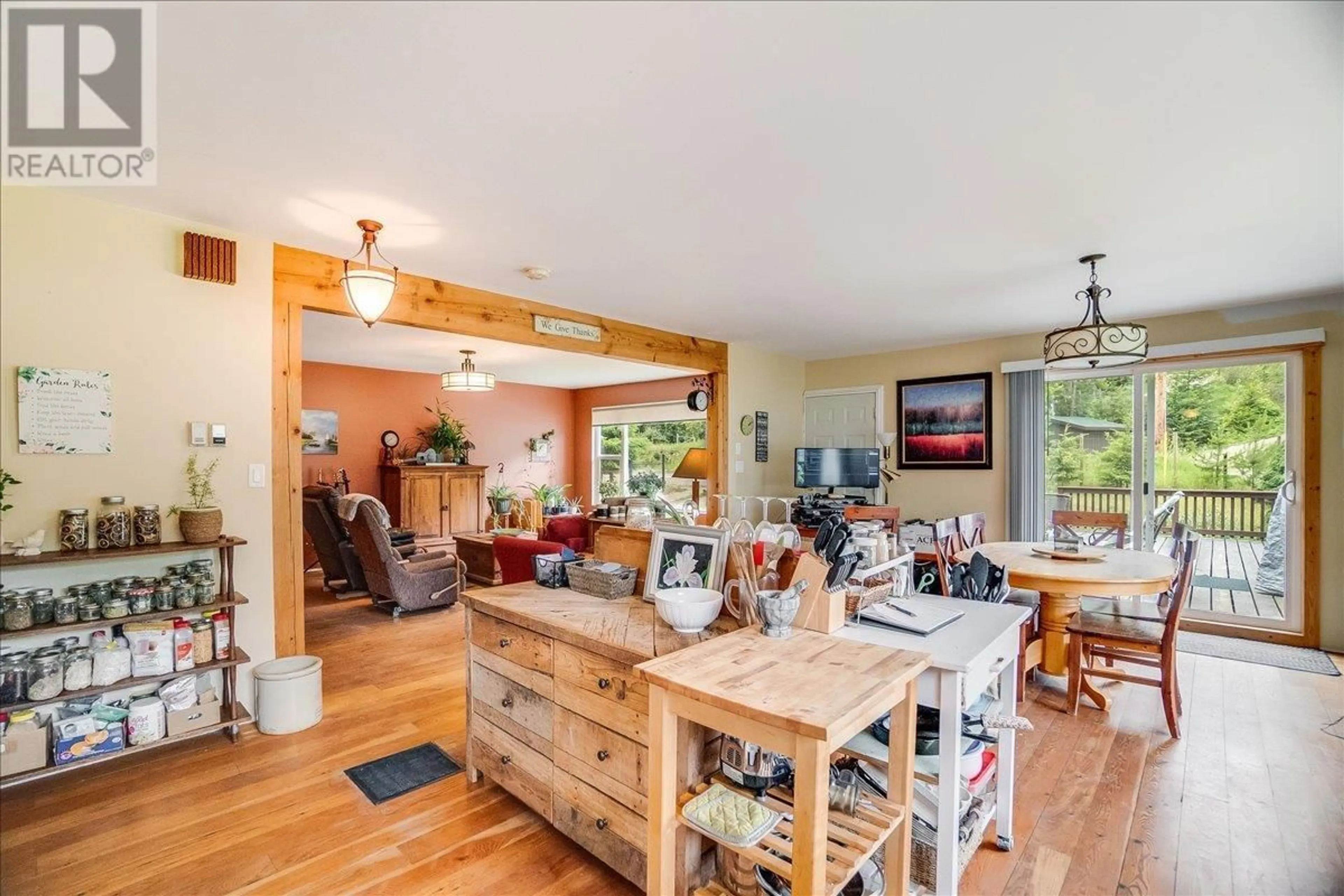 Open concept kitchen, wood/laminate floor for 3814 PASSMORE UPPER ROAD, Passmore British Columbia V0G2J0