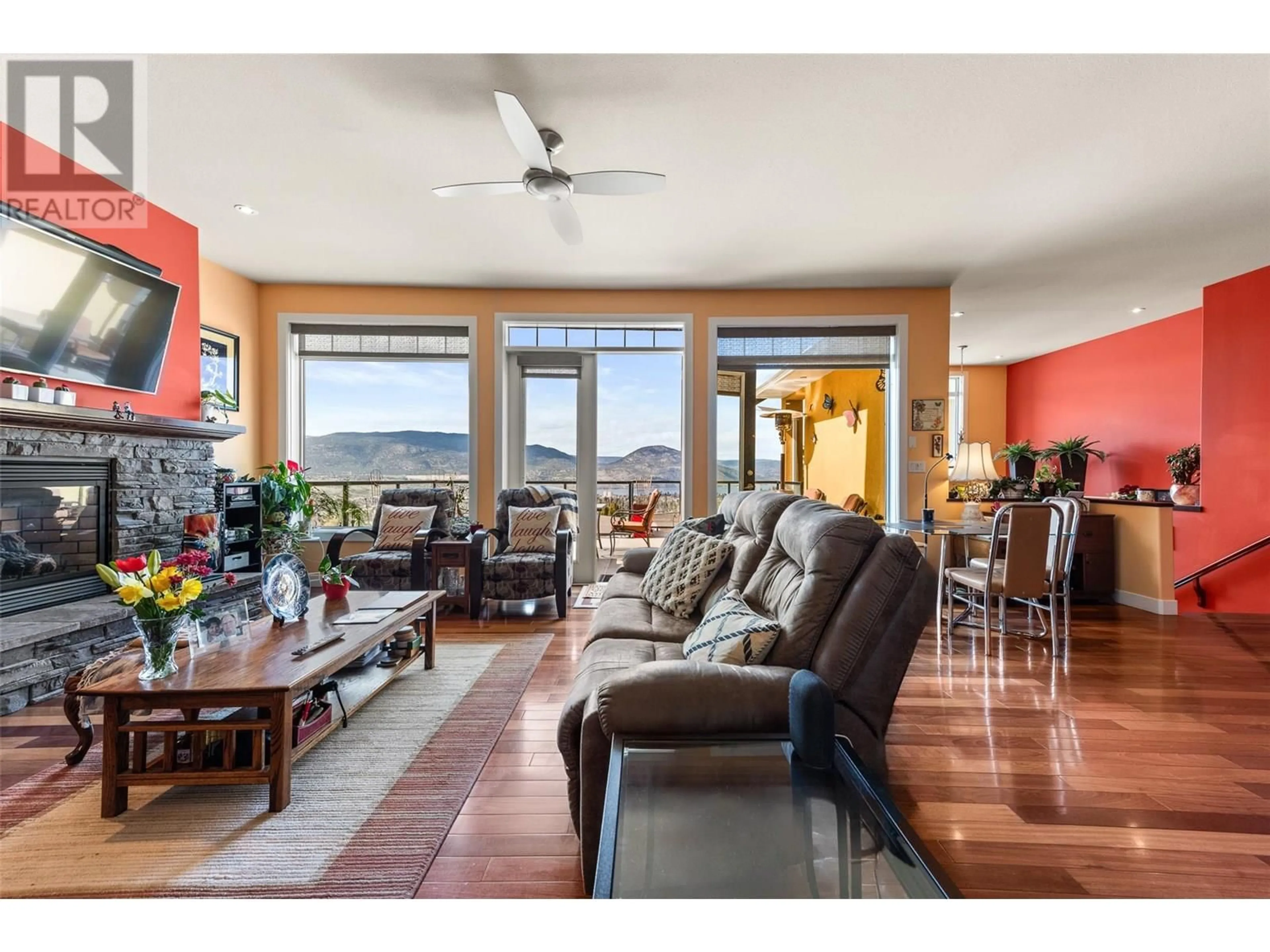 Living room with furniture, wood/laminate floor for 1576 HOLDEN ROAD, Penticton British Columbia V2A8M9