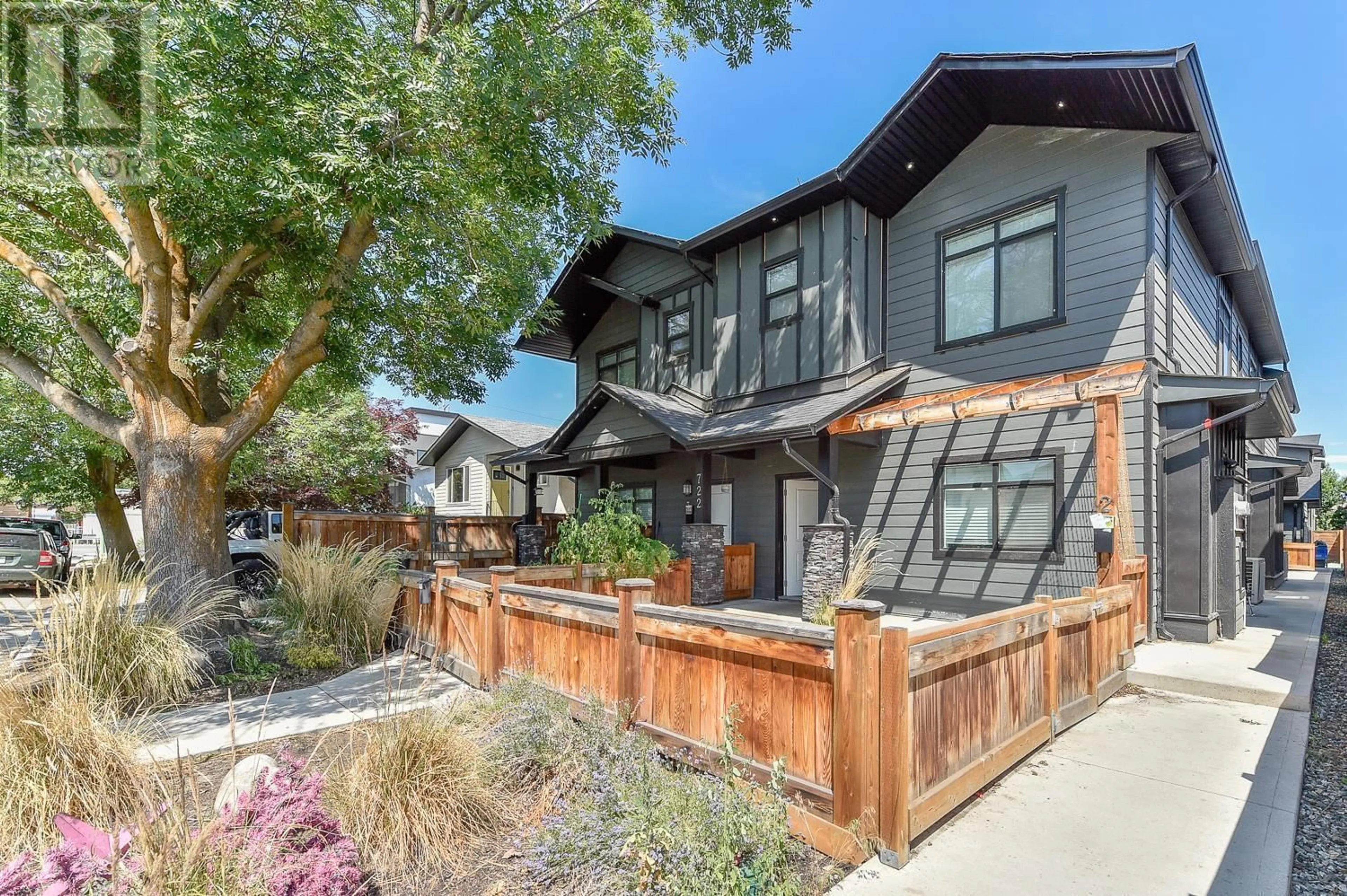 Home with brick exterior material, street for 2 - 722 COOPLAND CRESCENT, Kelowna British Columbia V1Y2V1