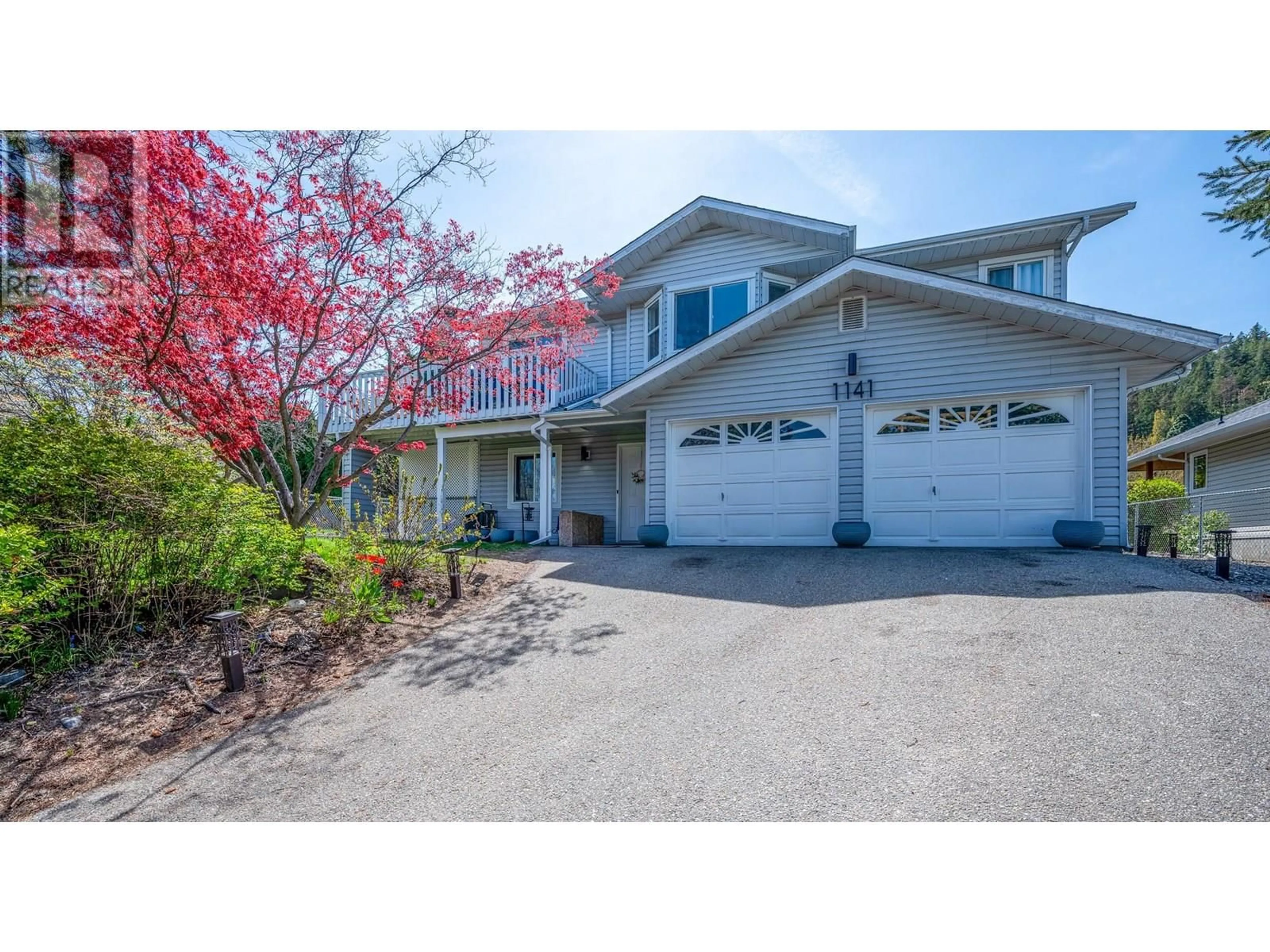 Home with vinyl exterior material, street for 1141 LYNDEN ROAD, West Kelowna British Columbia V1Z3L7