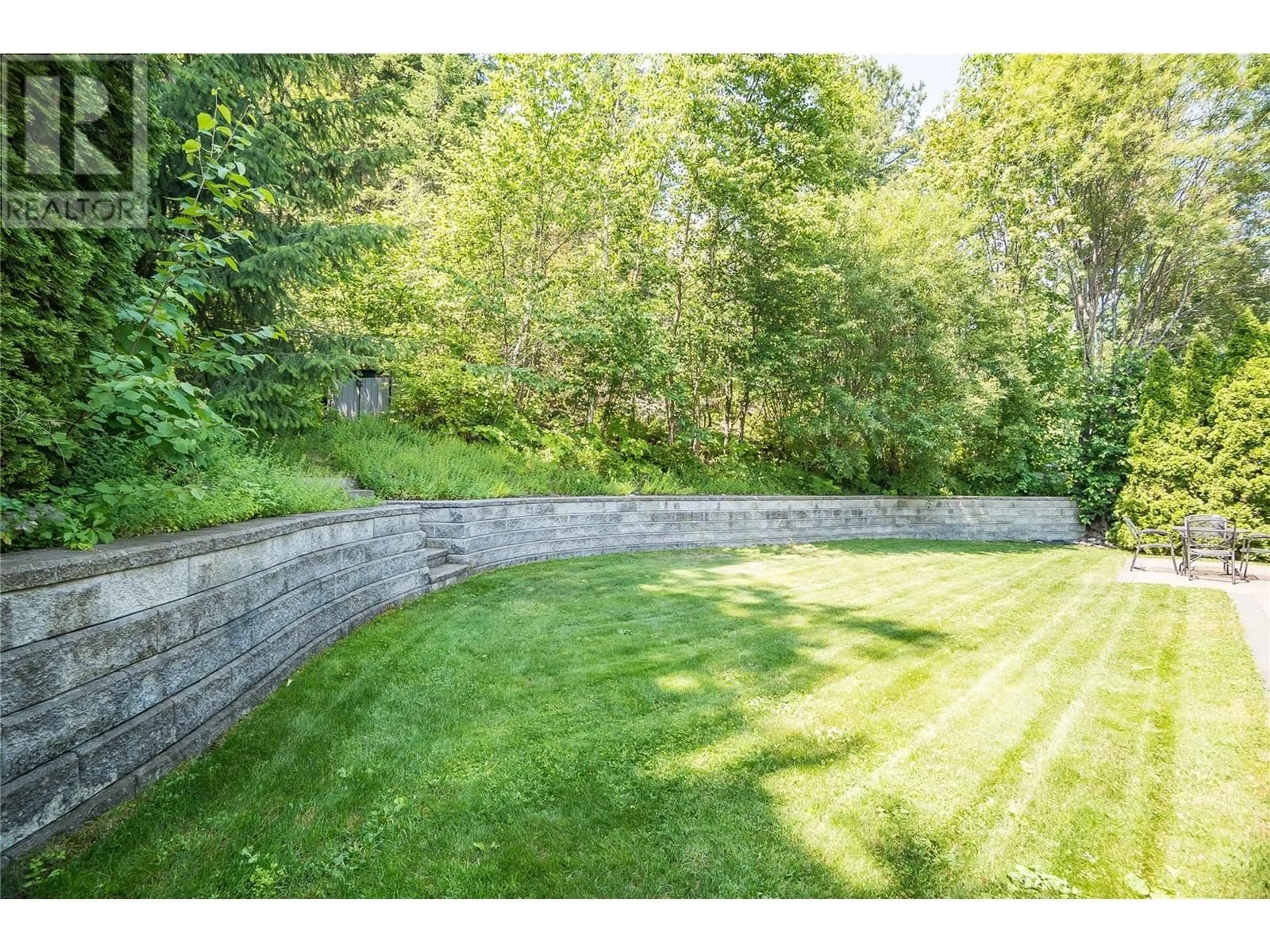 A pic from outside/outdoor area/front of a property/back of a property/a pic from drone, forest/trees view for 3378 14TH AVENUE, Castlegar British Columbia V1N4G1