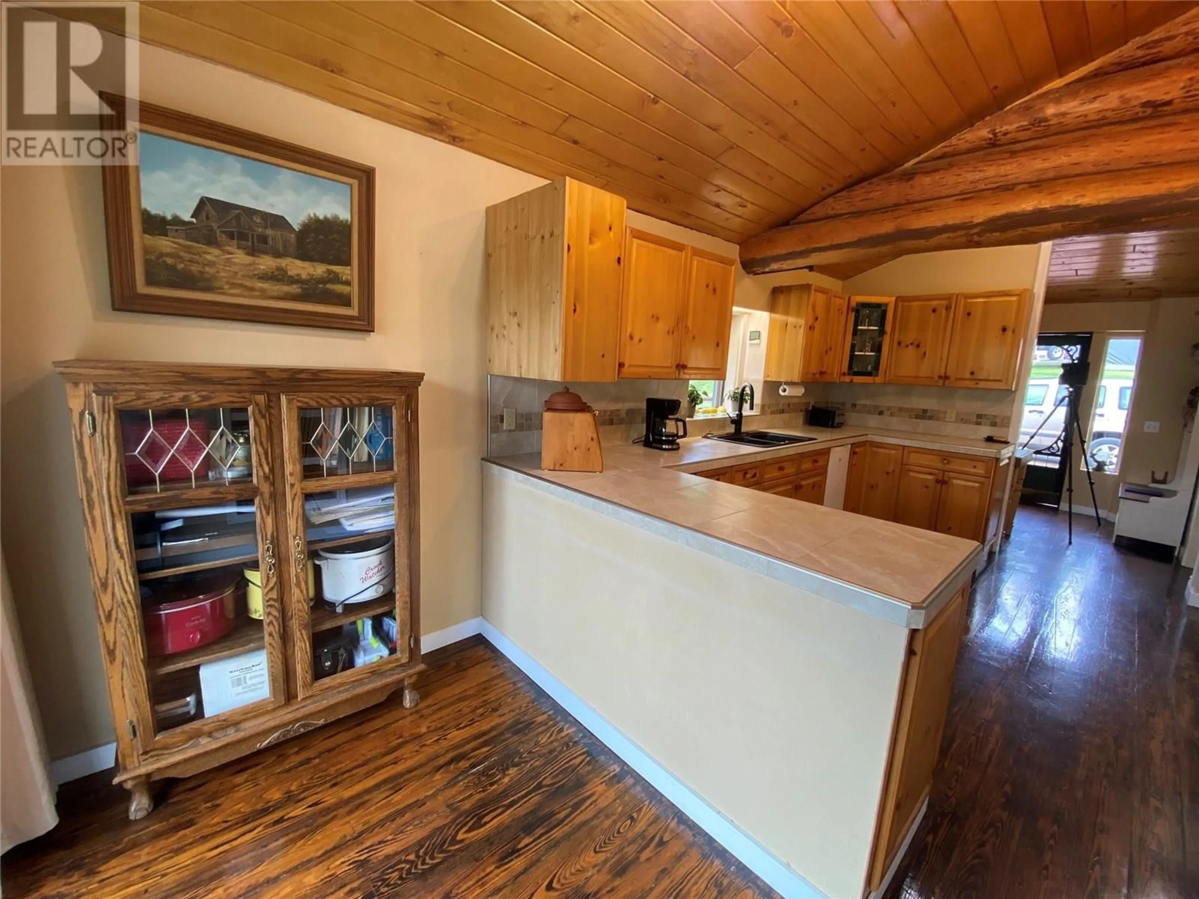 Open concept kitchen, wood/laminate floor for 4405 ERIE ROSS-SPUR ROAD, Salmo British Columbia V0G1L1