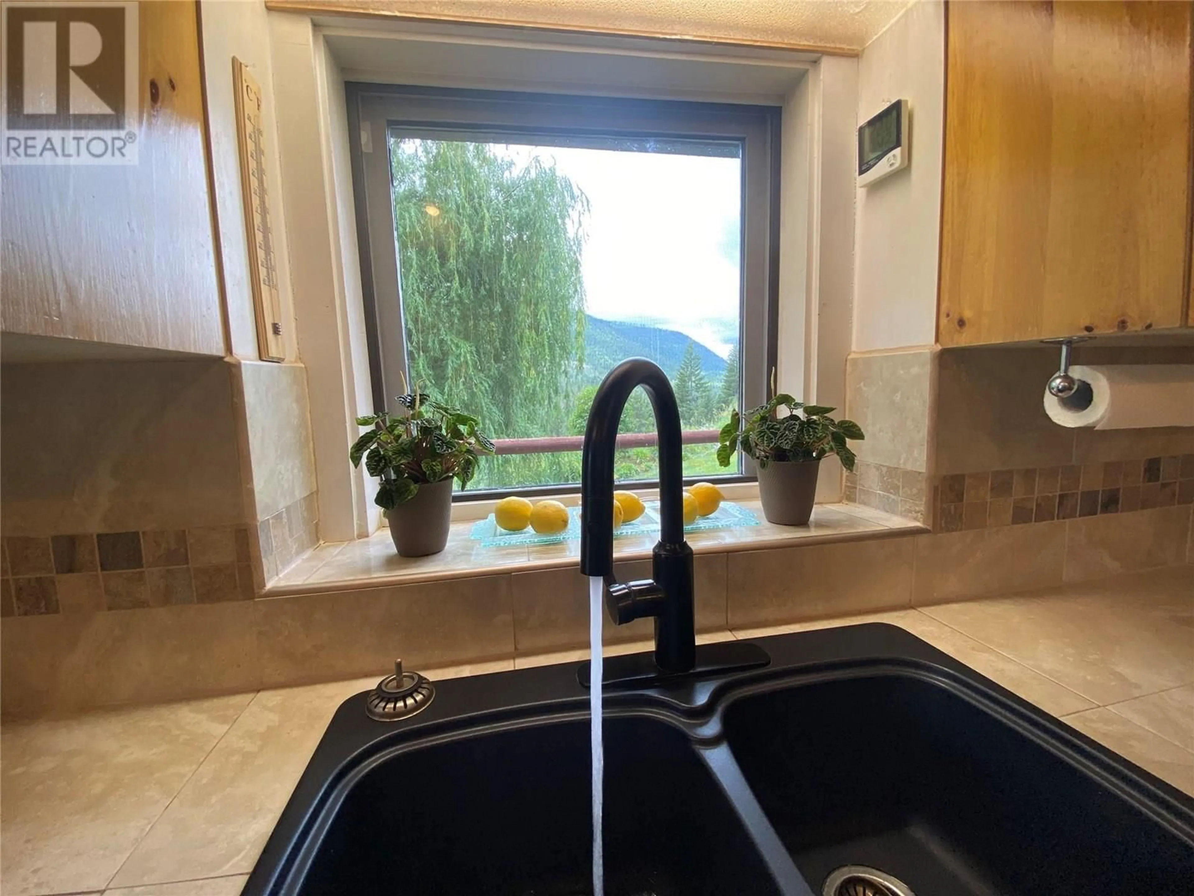 Standard kitchen, ceramic/tile floor for 4405 ERIE ROSS-SPUR ROAD, Salmo British Columbia V0G1L1
