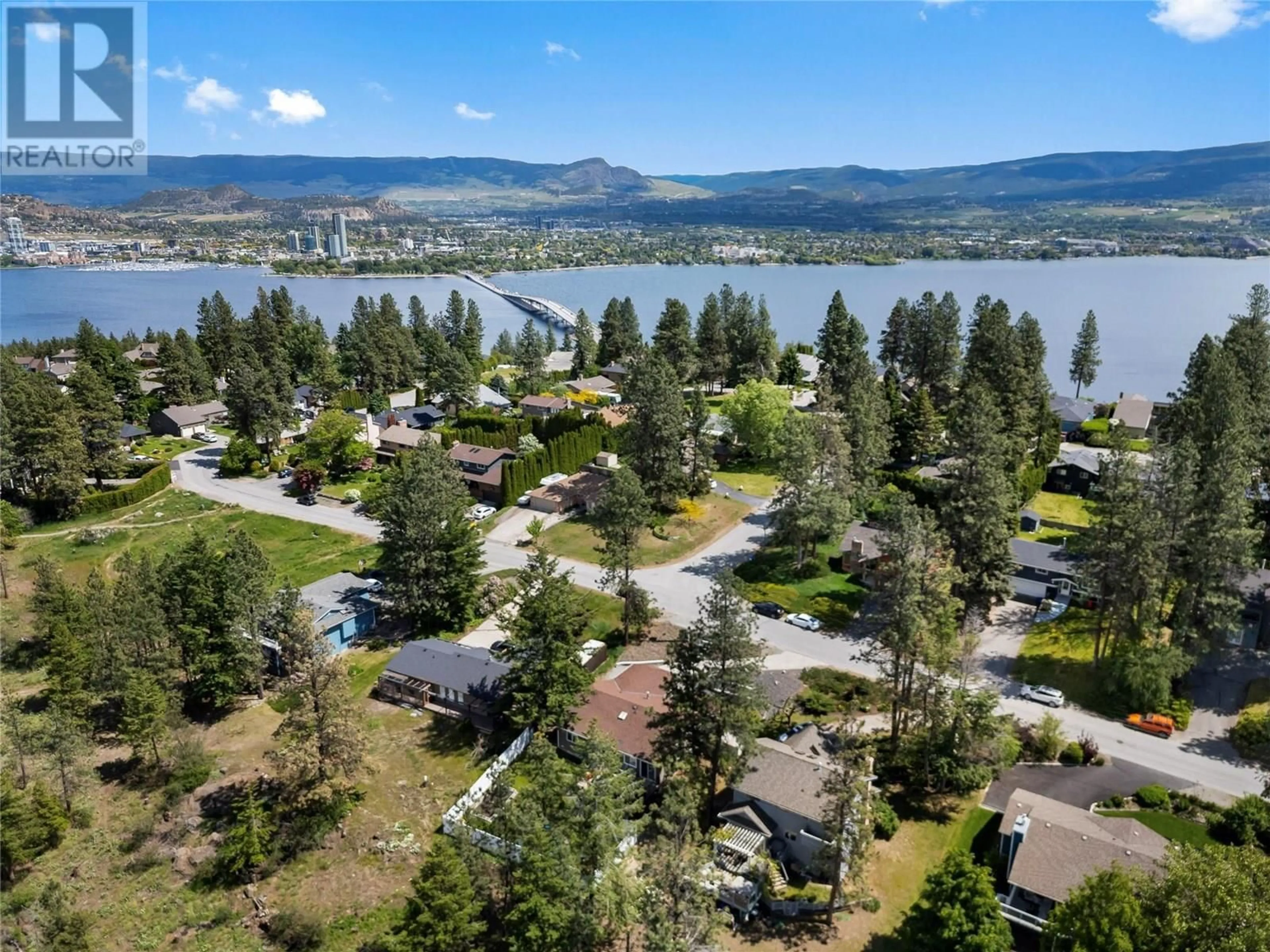 A pic from outside/outdoor area/front of a property/back of a property/a pic from drone, water/lake/river/ocean view for 2036 TOMAT AVENUE, West Kelowna British Columbia V1Z3C5