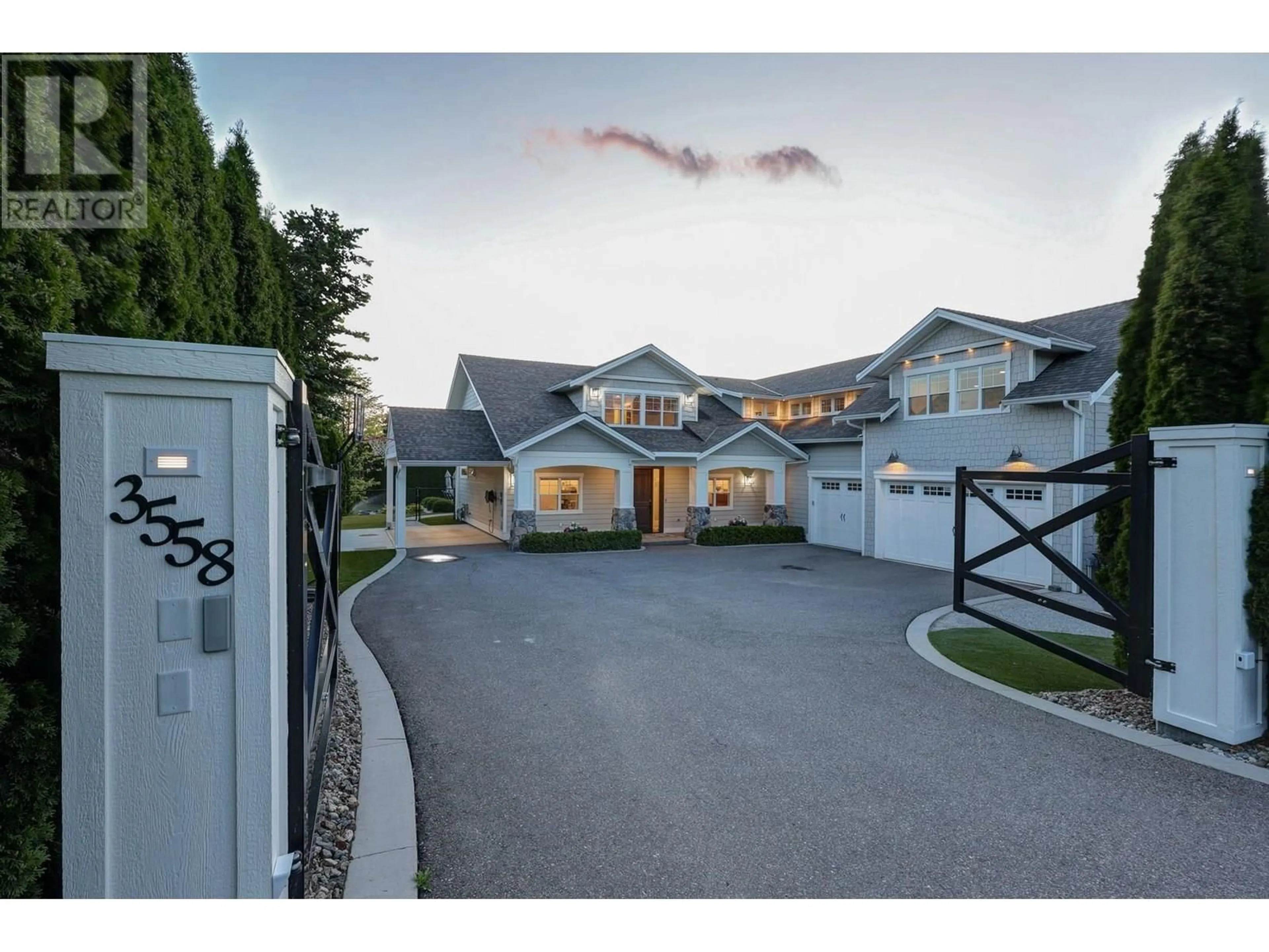 A pic from outside/outdoor area/front of a property/back of a property/a pic from drone, street for 3558 SPIERS ROAD, Kelowna British Columbia V1W4A8