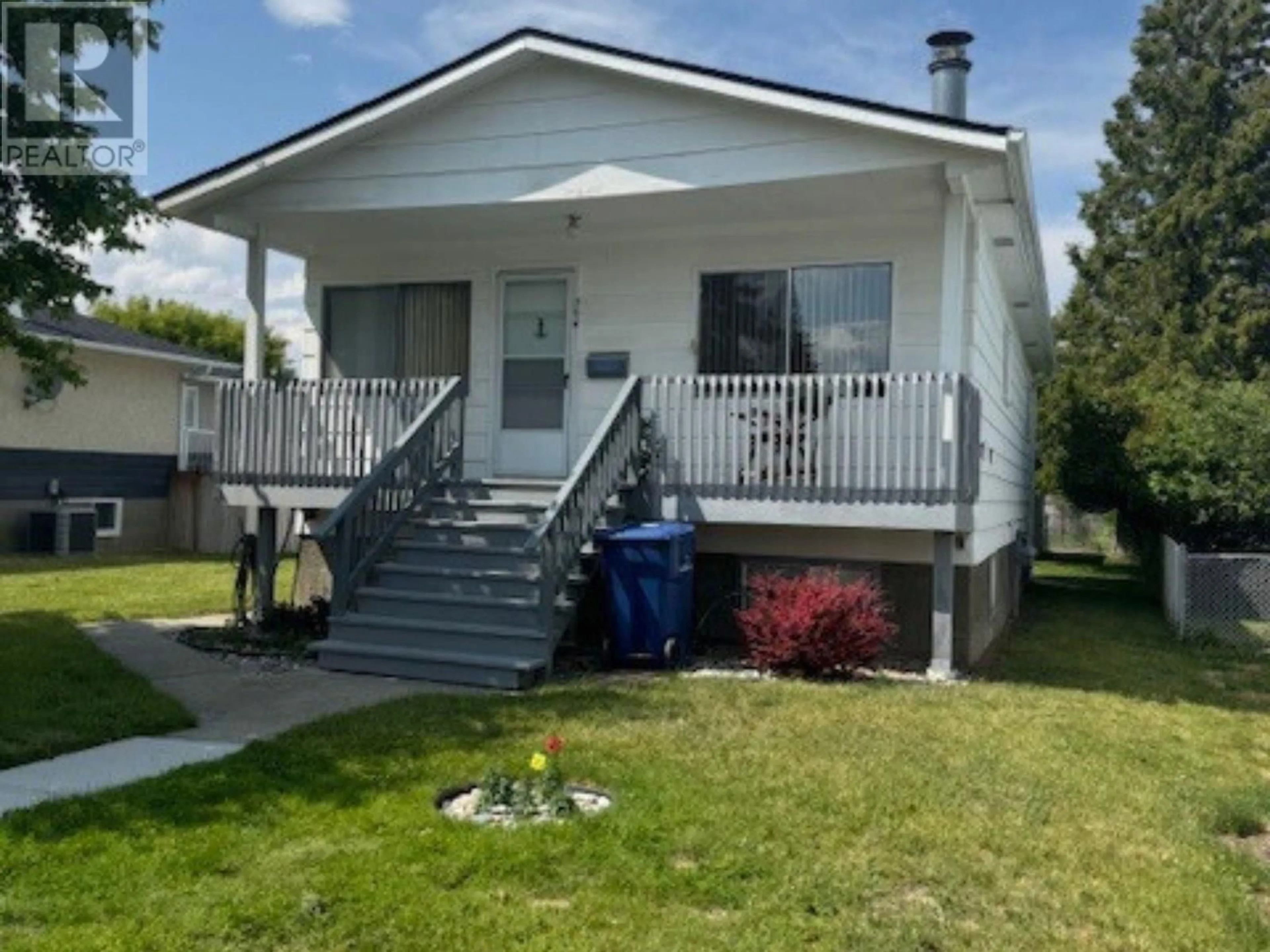 Home with vinyl exterior material, street for 306 6TH STREET SOUTH, Cranbrook British Columbia V1C1K8