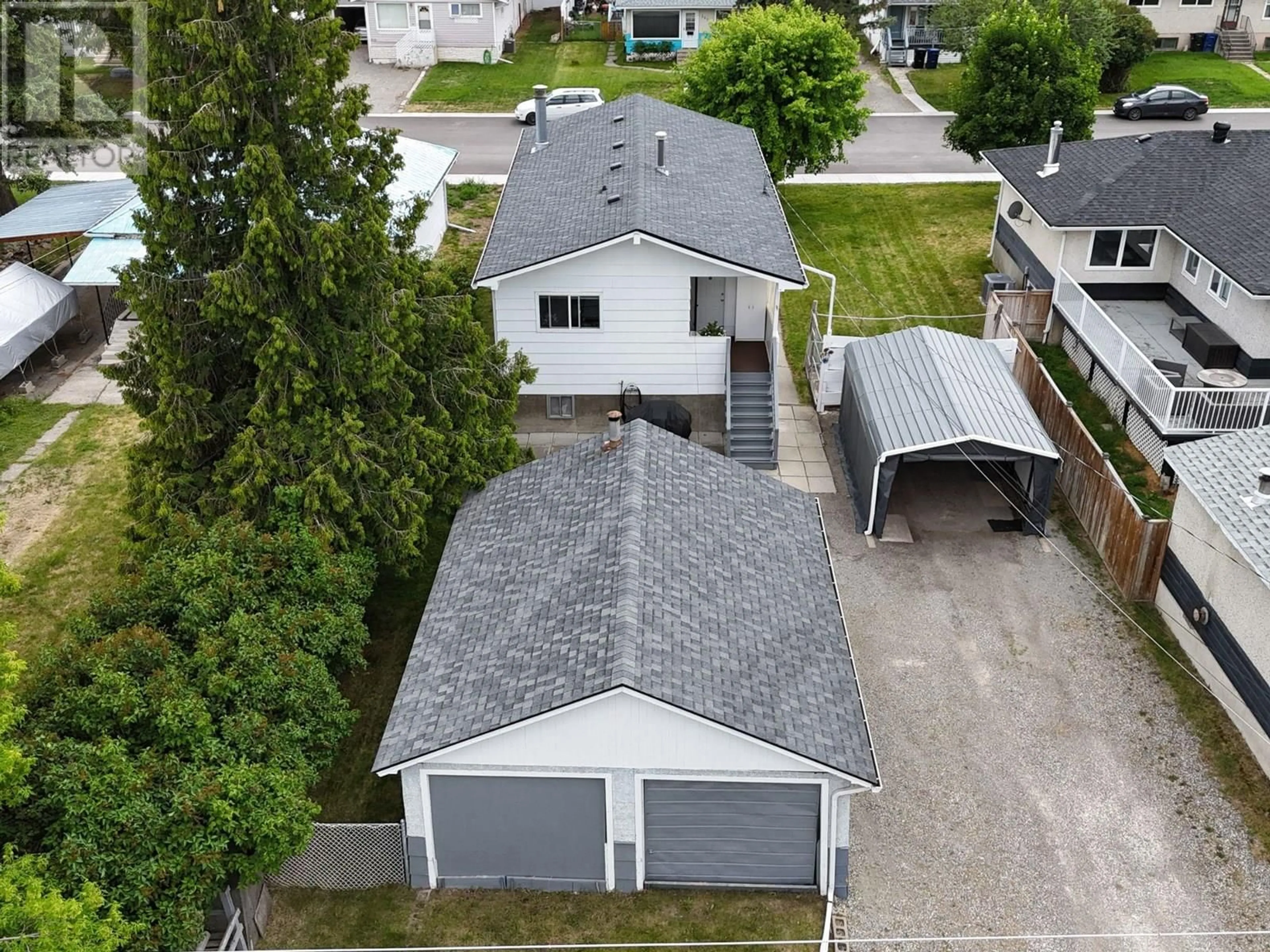 A pic from outside/outdoor area/front of a property/back of a property/a pic from drone, street for 306 6TH STREET SOUTH, Cranbrook British Columbia V1C1K8