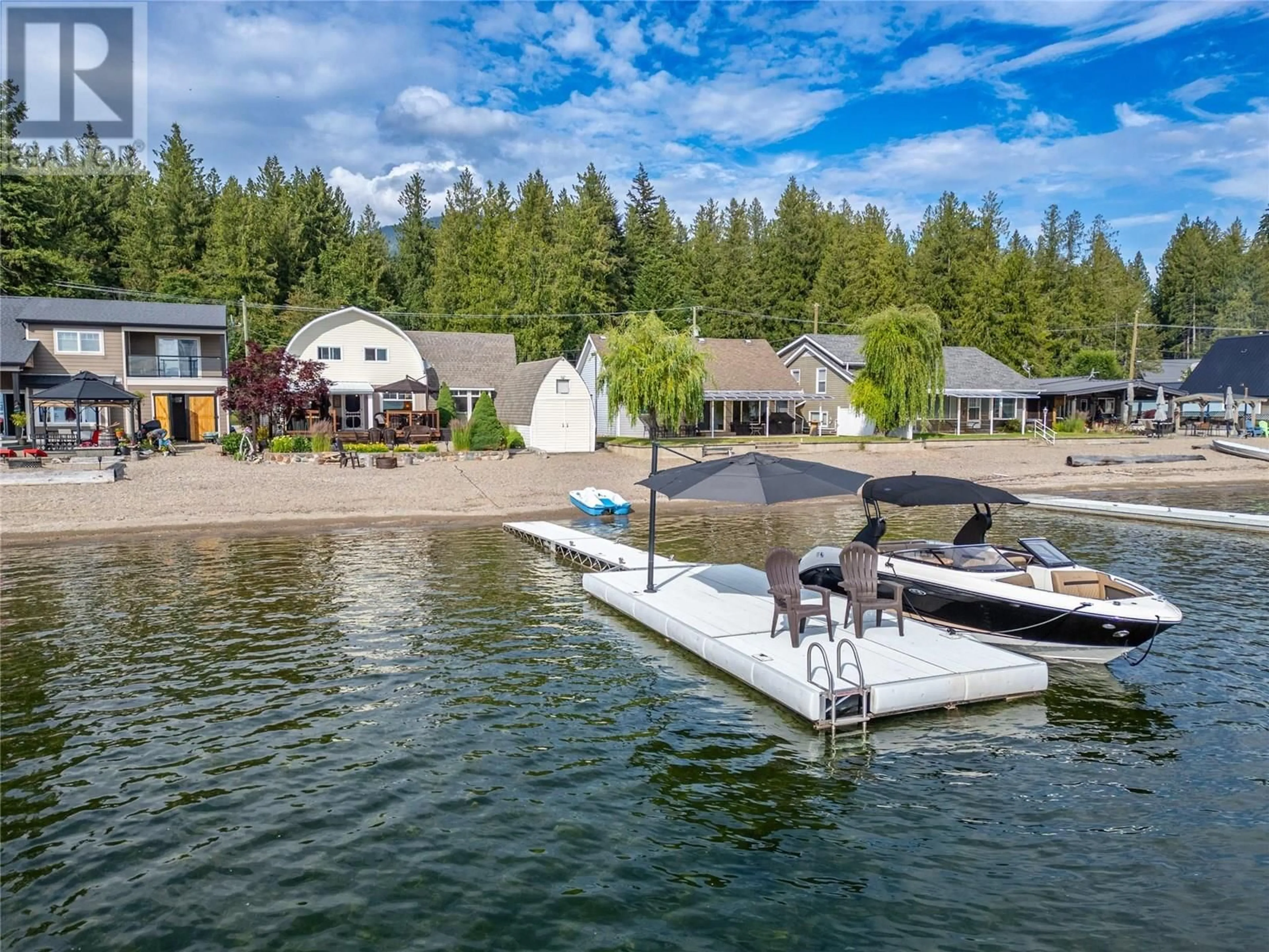 A pic from outside/outdoor area/front of a property/back of a property/a pic from drone, water/lake/river/ocean view for 6792 SQUILAX-ANGLEMONT ROAD, Magna Bay British Columbia V0E1M7