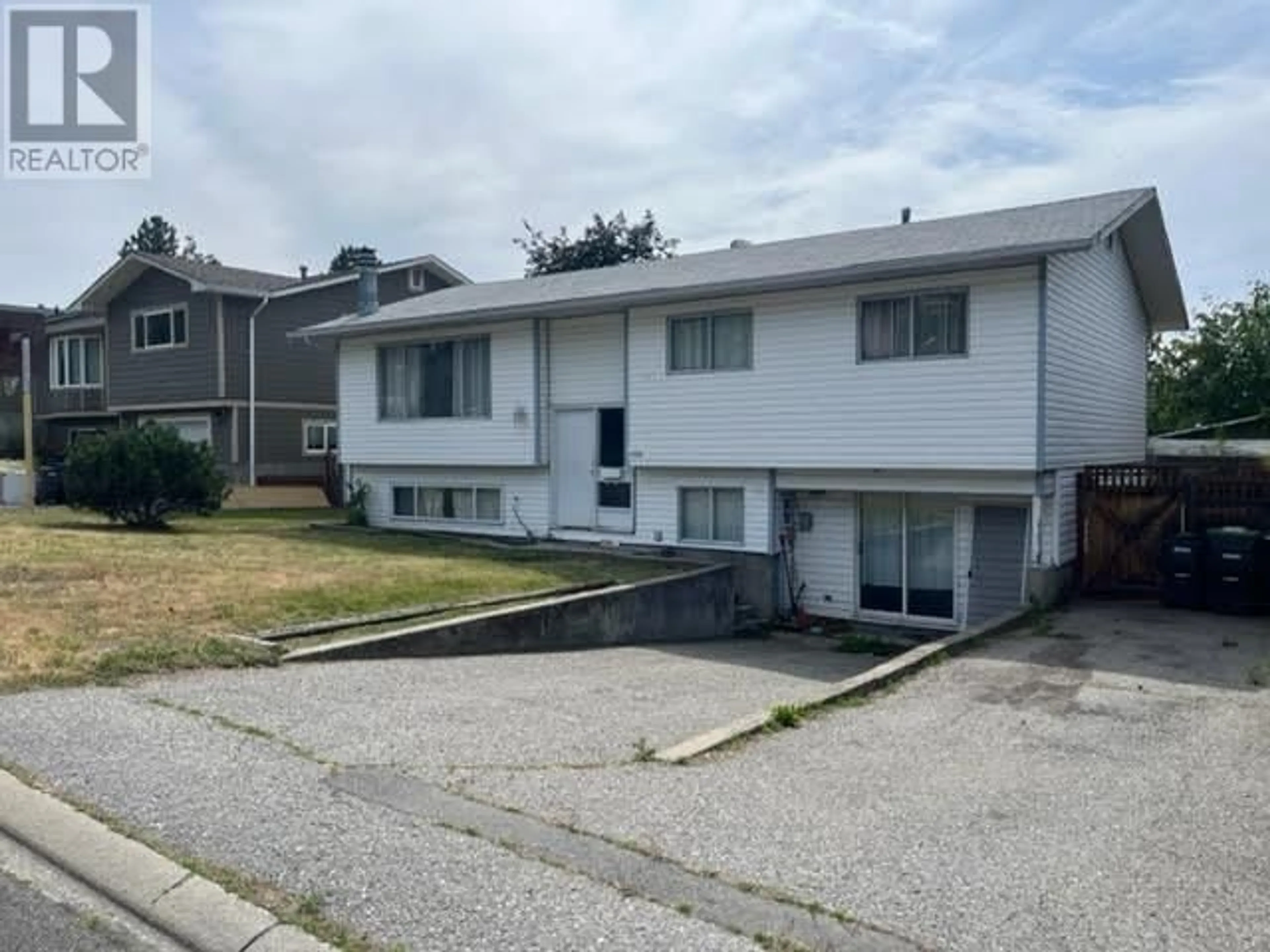 A pic from outside/outdoor area/front of a property/back of a property/a pic from drone, street for 158 BRACEWELL DRIVE, Penticton British Columbia V2A6S8