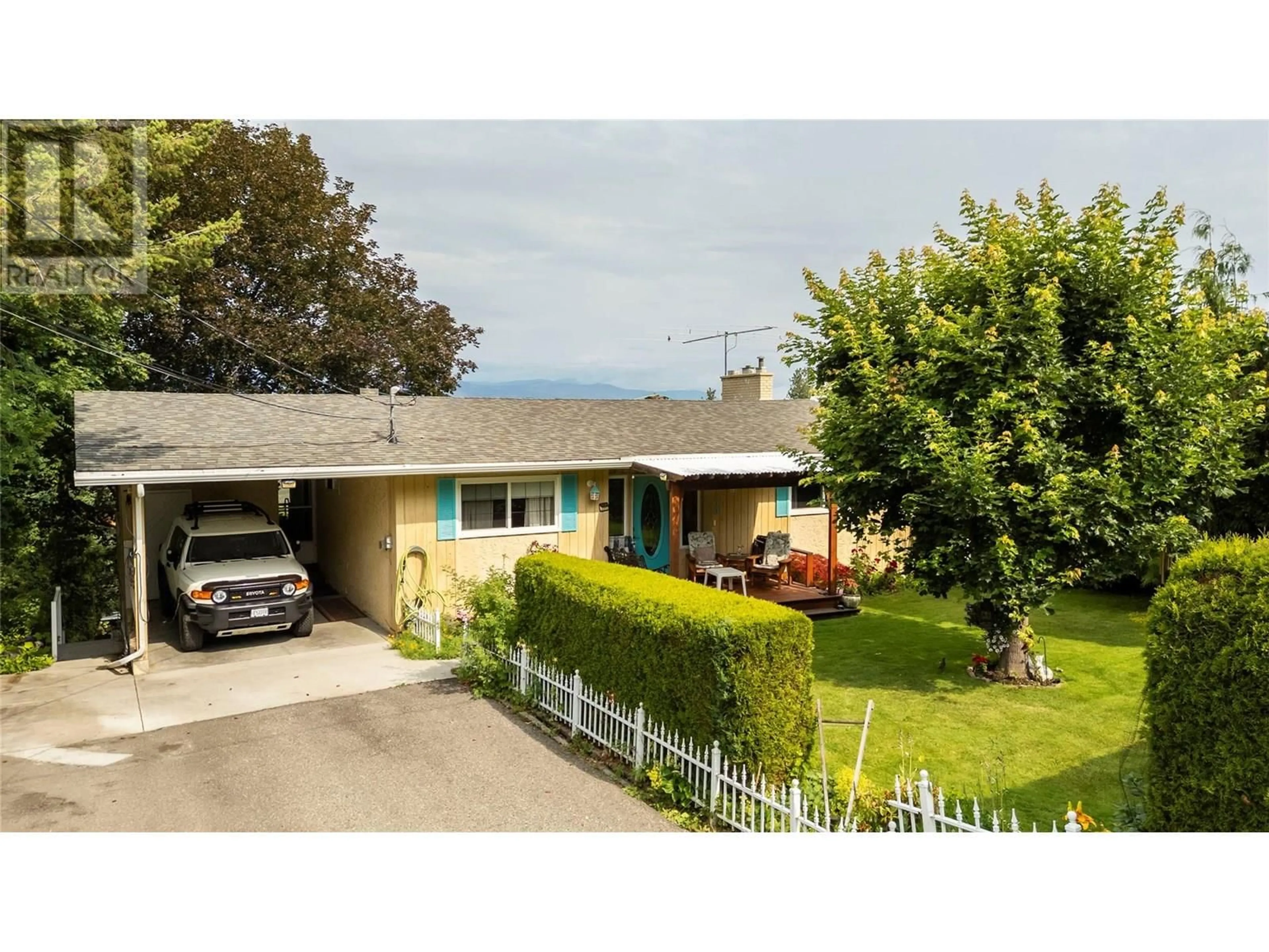 A pic from outside/outdoor area/front of a property/back of a property/a pic from drone, mountain view for 2300 CHARLESWOOD DRIVE, Kelowna British Columbia V1P1E4
