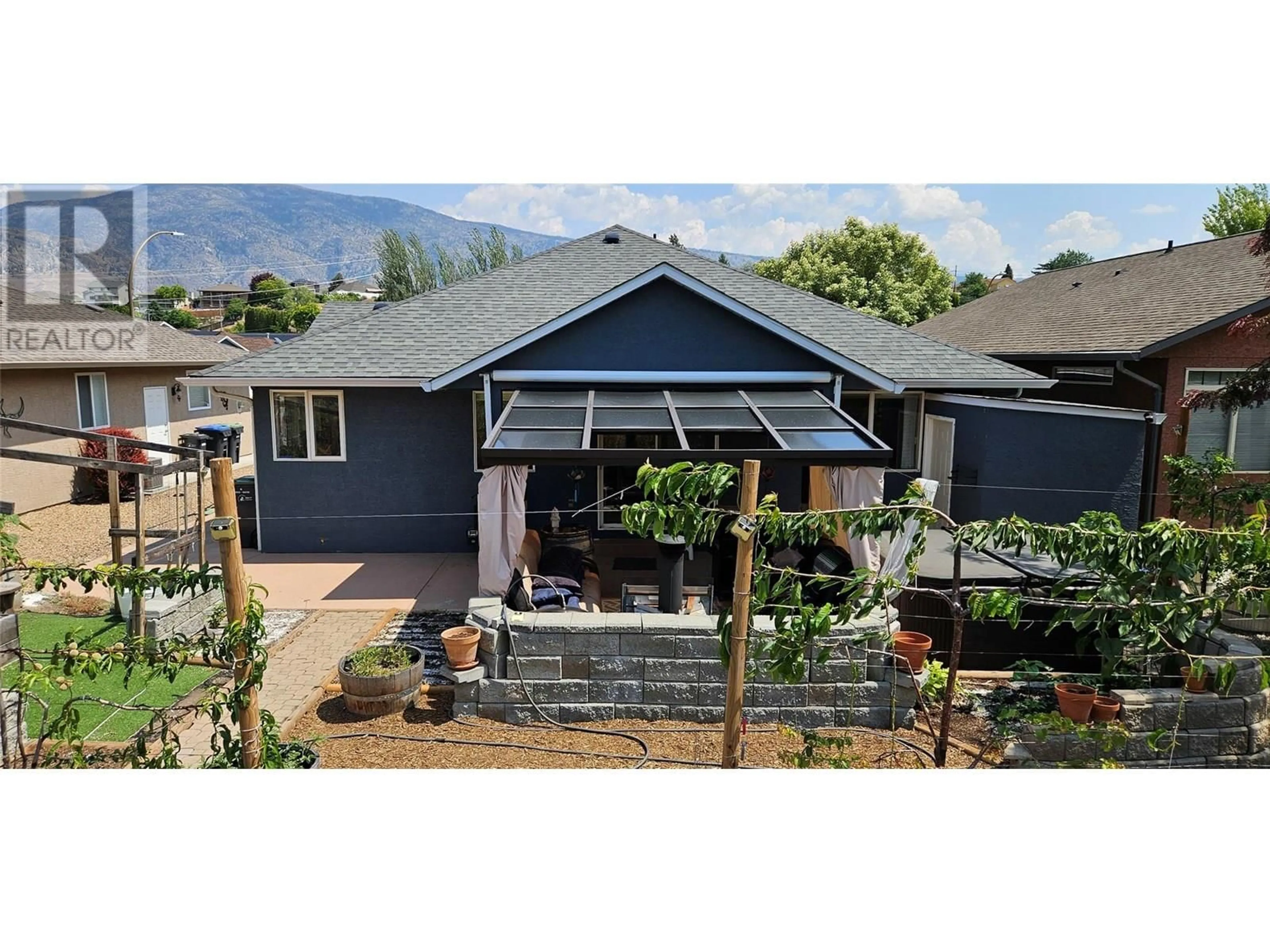 Home with vinyl exterior material, mountain view for 190 WILLOWS PLACE, Oliver British Columbia V0H1T4