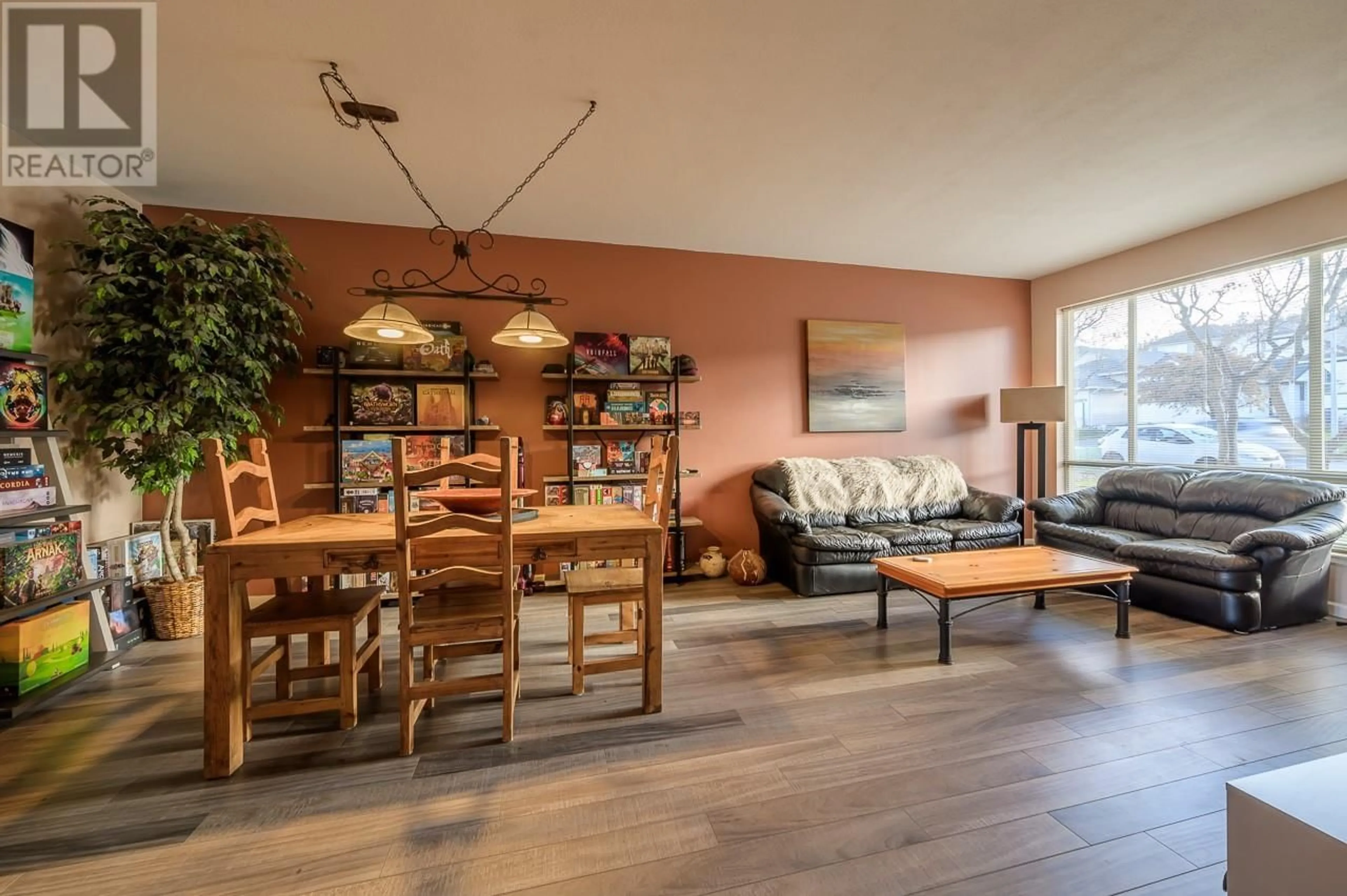 Living room with furniture, wood/laminate floor for #8 - 2365 ABBEYGLEN WAY, Kamloops British Columbia V1S1Y3