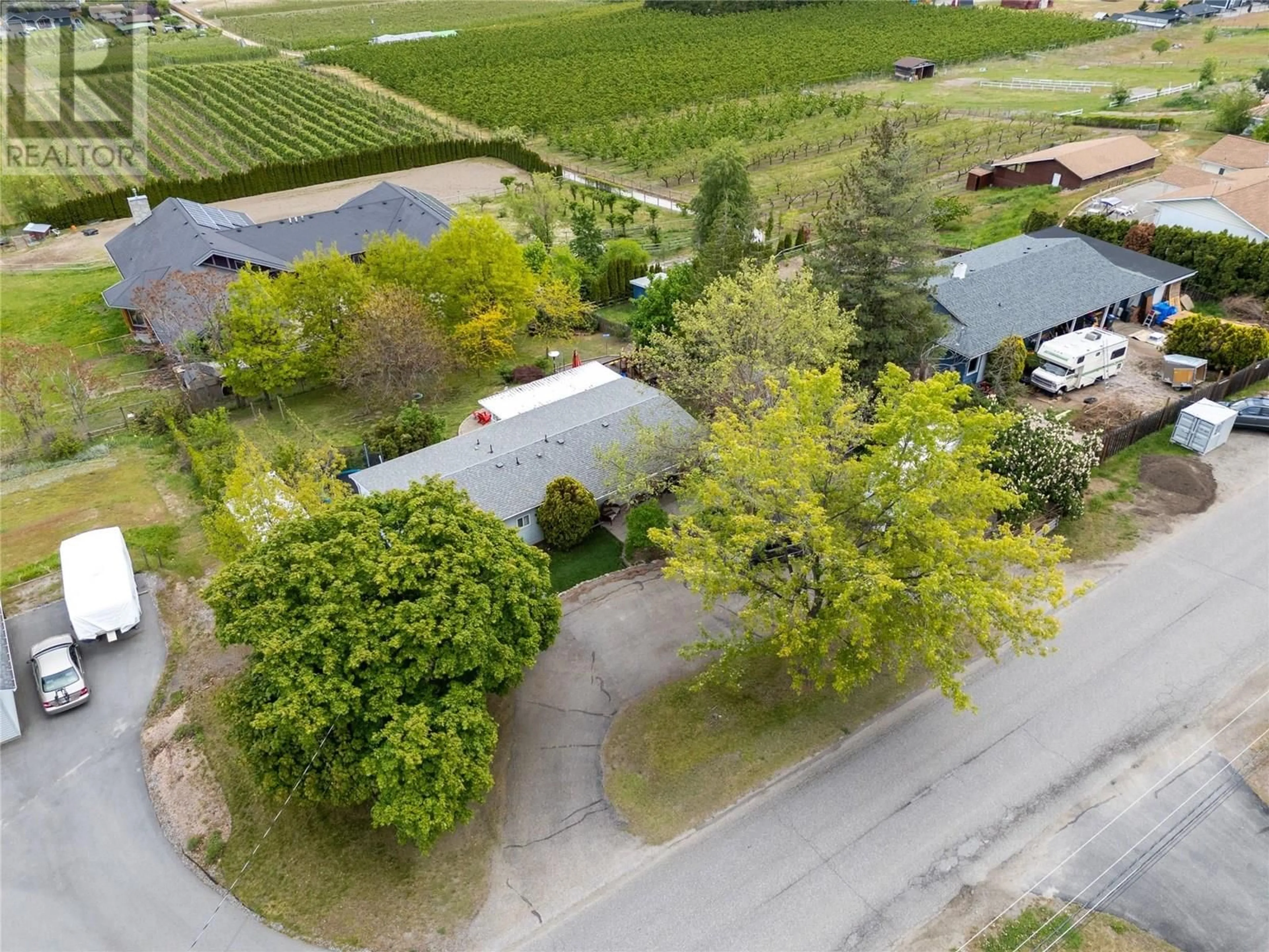 A pic from outside/outdoor area/front of a property/back of a property/a pic from drone, street for 11331 BOND ROAD, Lake Country British Columbia V4V1J5