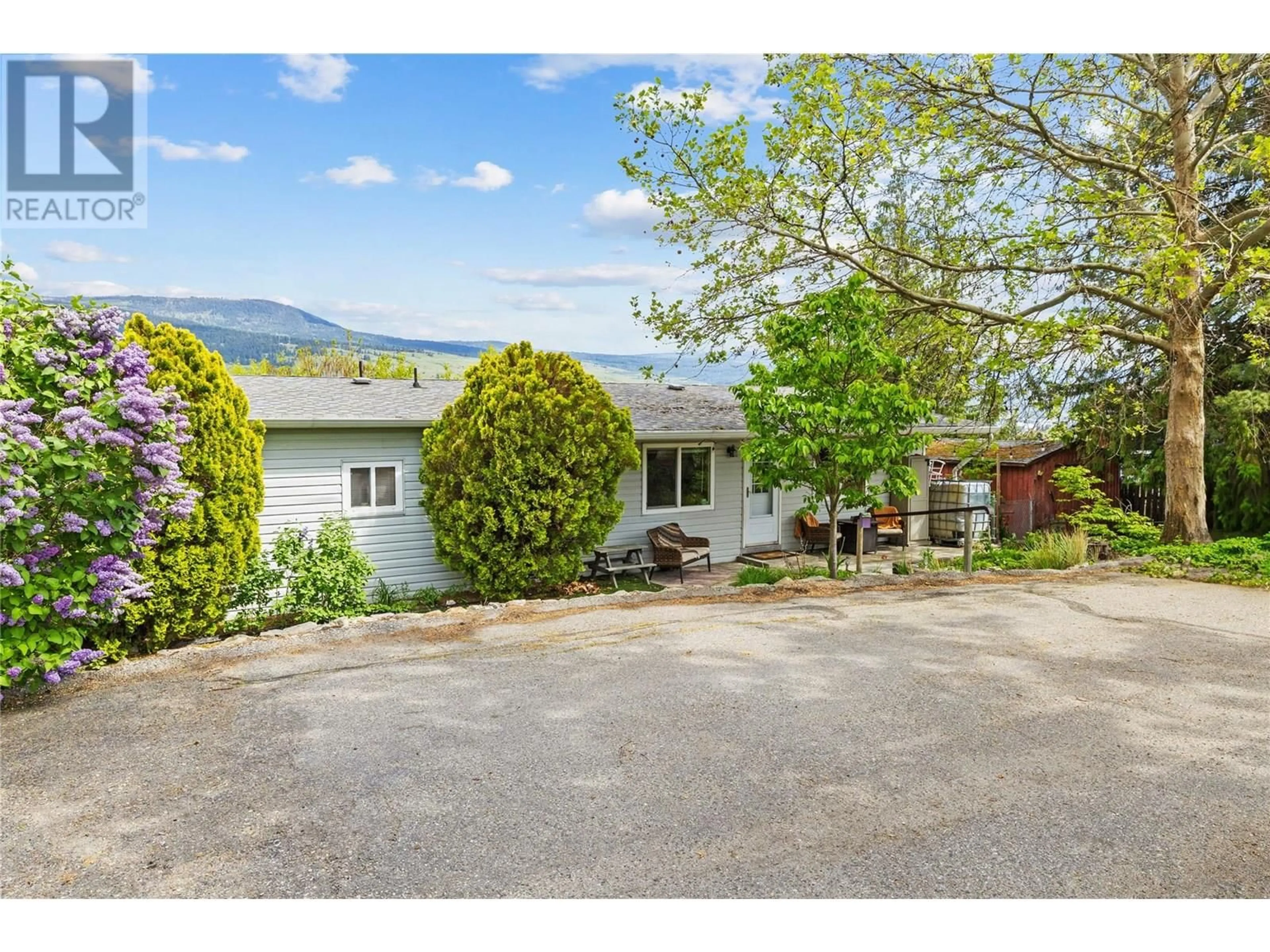A pic from outside/outdoor area/front of a property/back of a property/a pic from drone, mountain view for 11331 BOND ROAD, Lake Country British Columbia V4V1J5