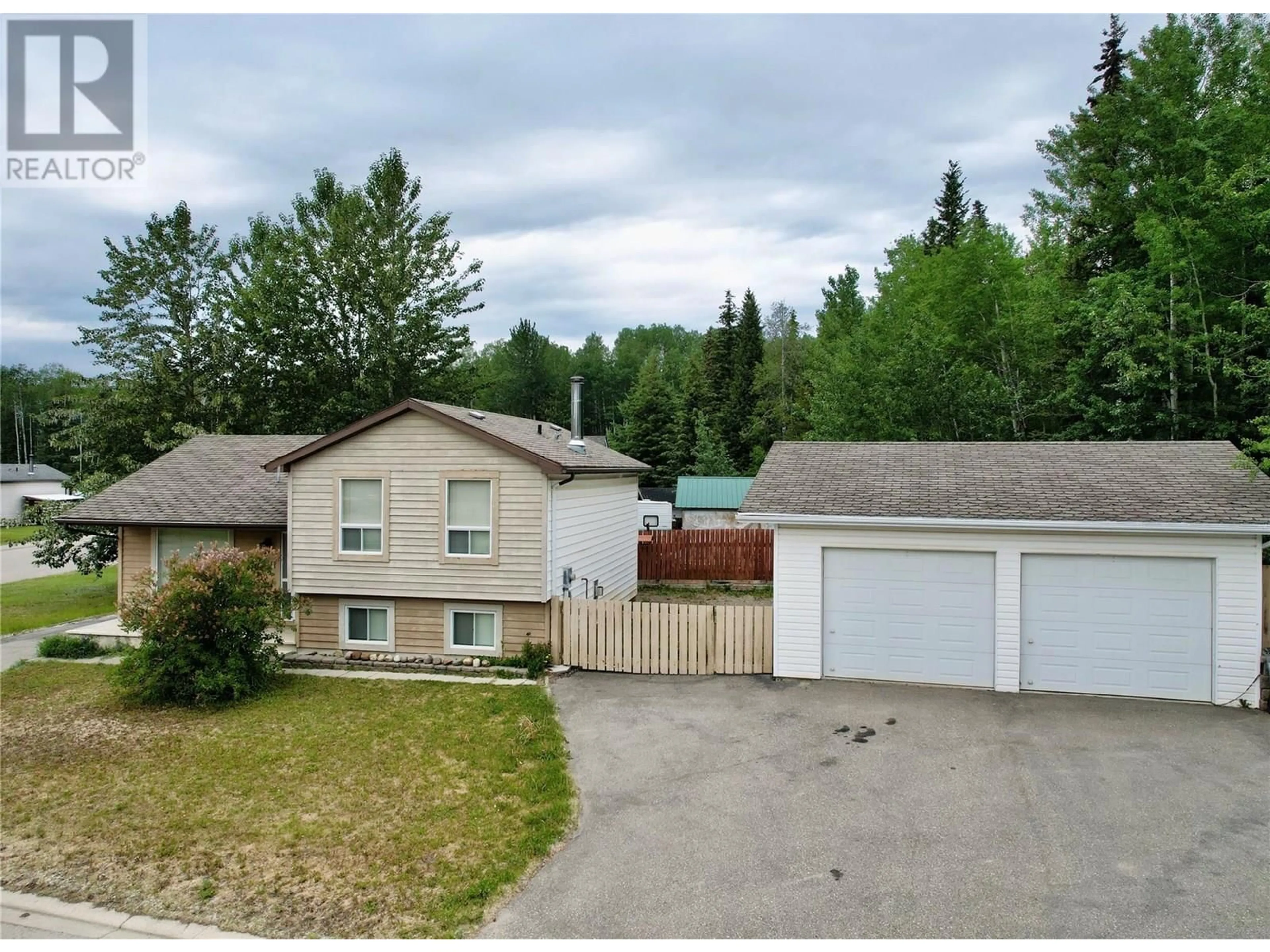 A pic from outside/outdoor area/front of a property/back of a property/a pic from drone, street for 104 GWILLIM CRESCENT, Tumbler Ridge British Columbia V0C2W0