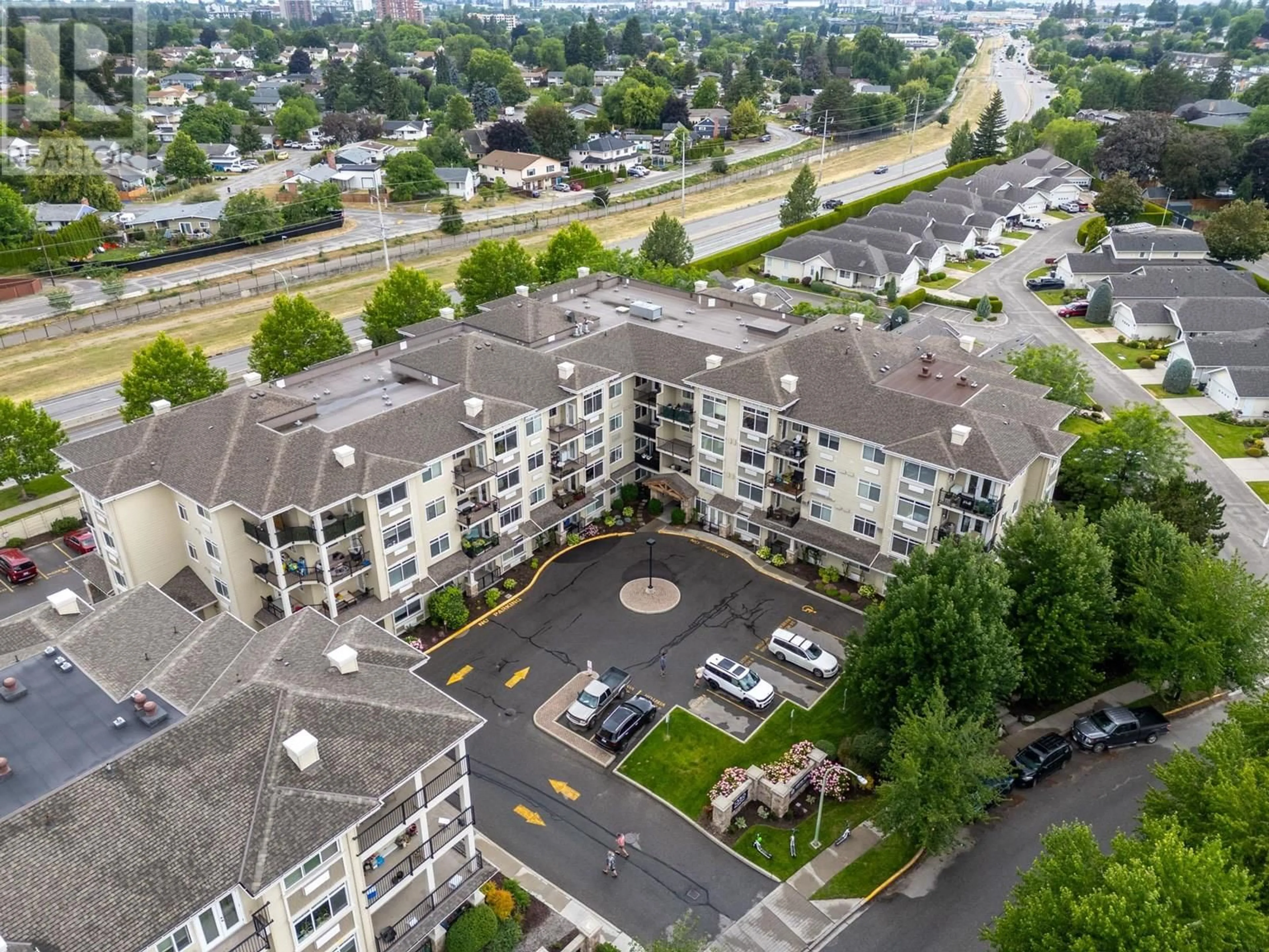 A pic from outside/outdoor area/front of a property/back of a property/a pic from drone, city buildings view from balcony for 209 - 1350 RIDGEWAY DRIVE, Kelowna British Columbia V1Y9T8