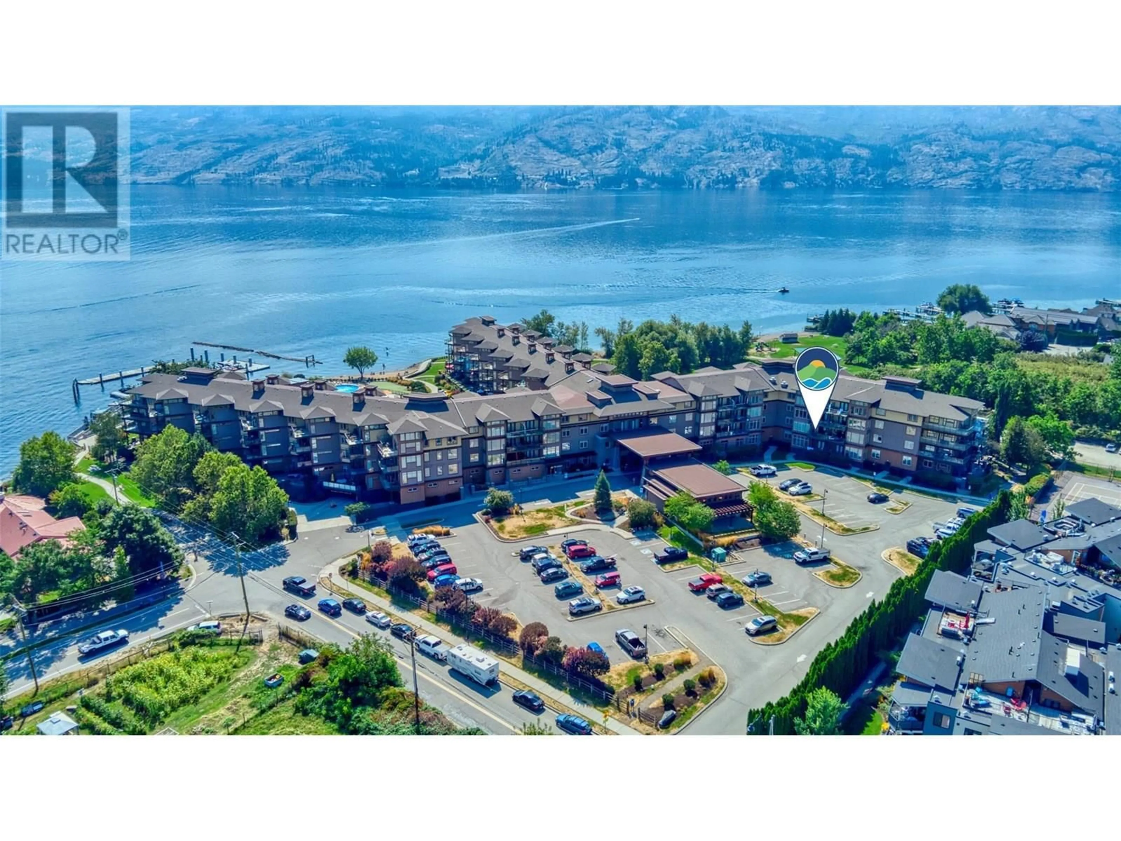 A pic from outside/outdoor area/front of a property/back of a property/a pic from drone, water/lake/river/ocean view for 241 - 4205 GELLATLY ROAD, West Kelowna British Columbia V4T2K2