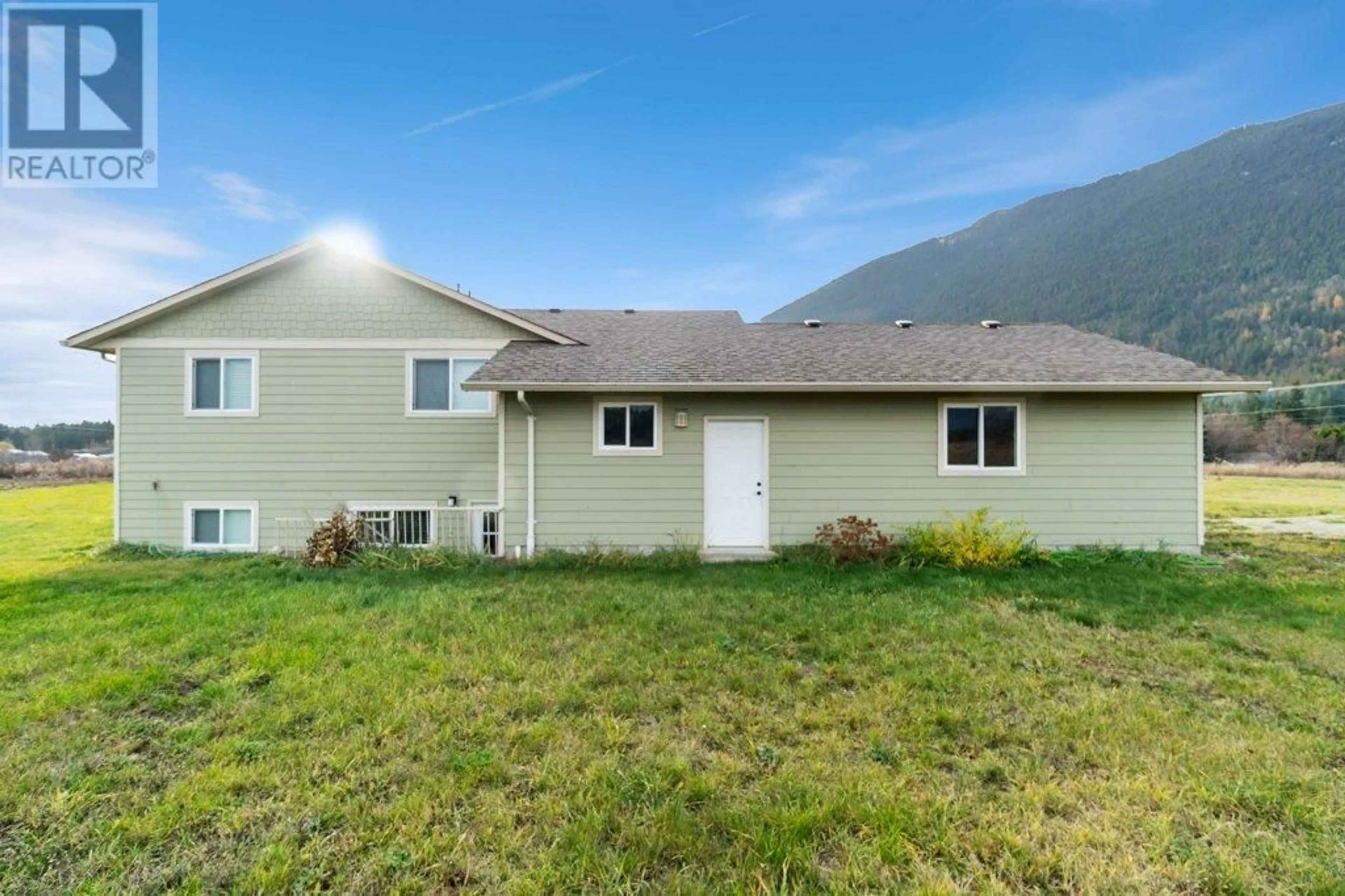 A pic from outside/outdoor area/front of a property/back of a property/a pic from drone, mountain view for 624 TAPPEN VALLEY ROAD, Tappen British Columbia V0E2X3