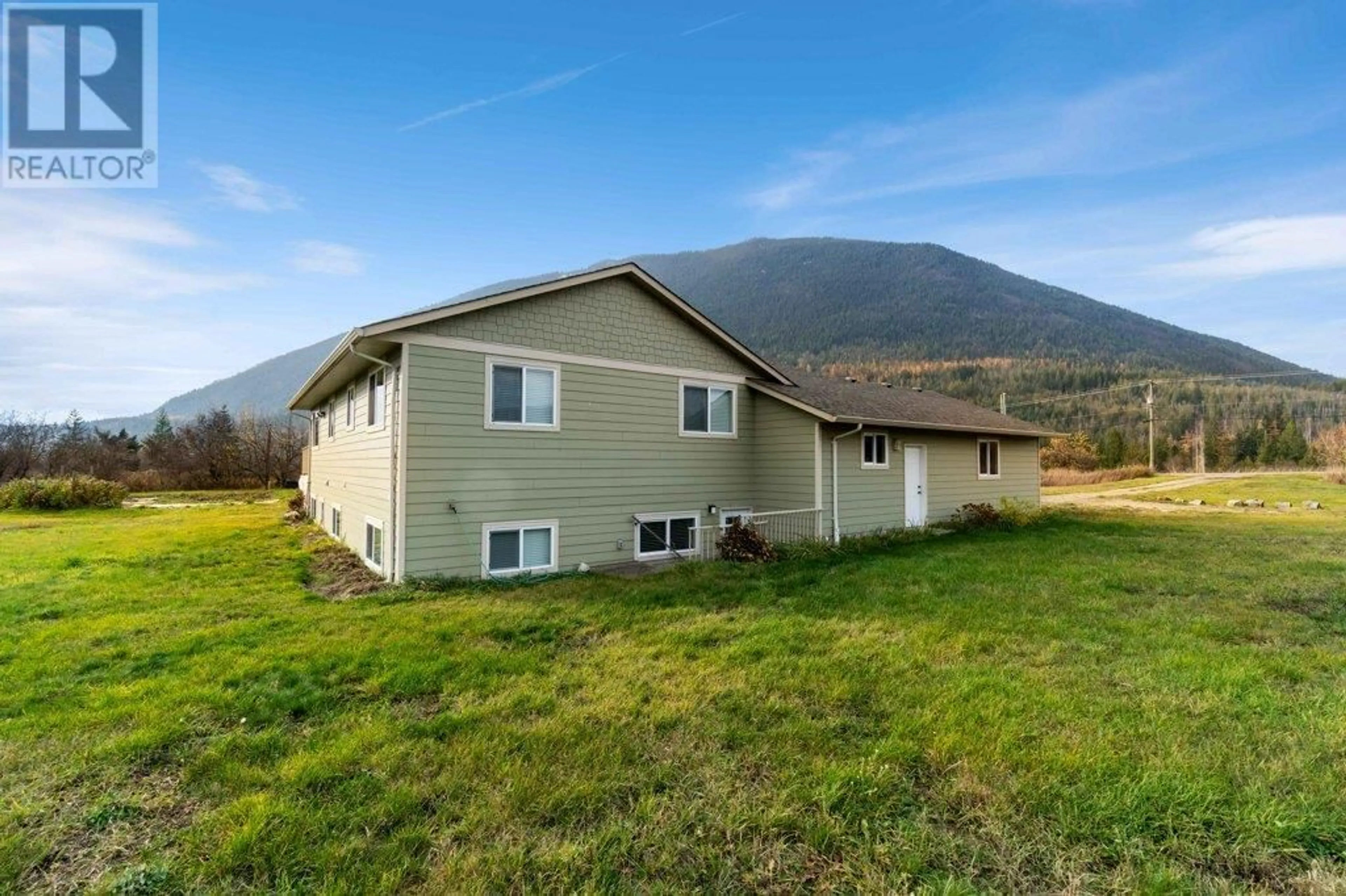 A pic from outside/outdoor area/front of a property/back of a property/a pic from drone, mountain view for 624 TAPPEN VALLEY ROAD, Tappen British Columbia V0E2X3