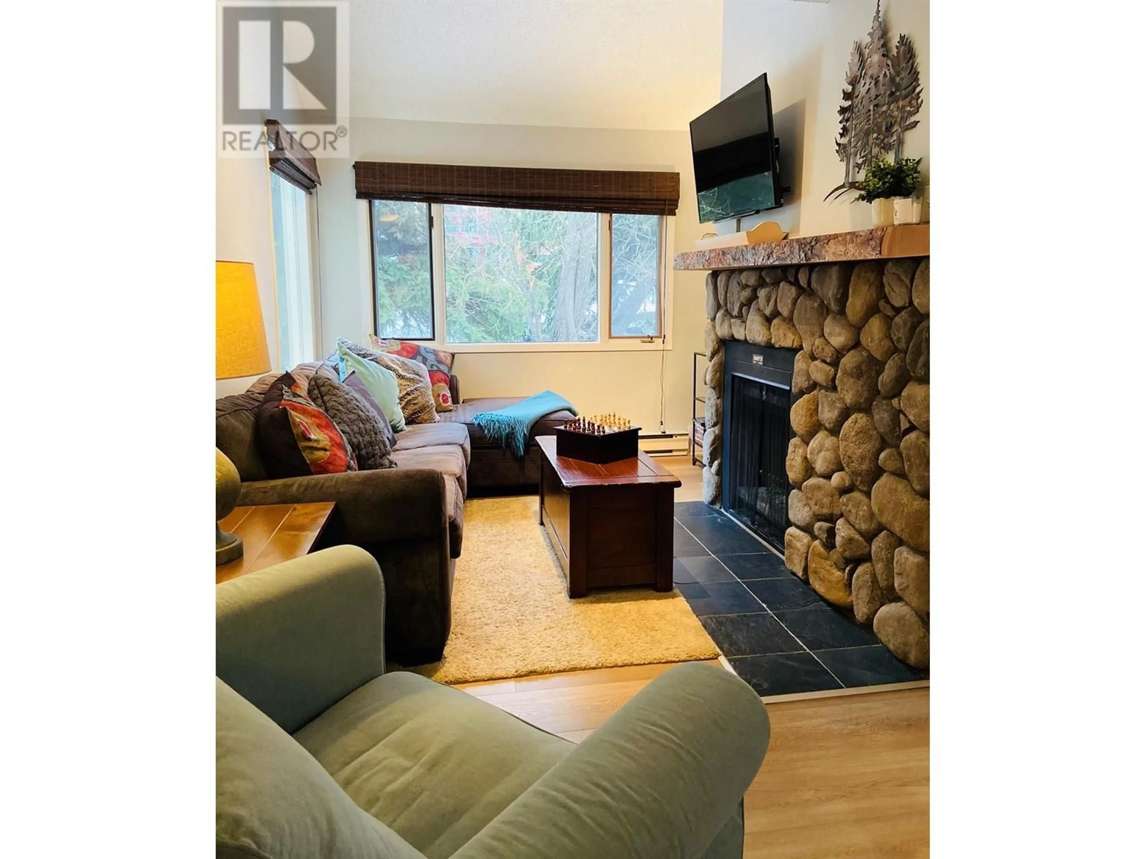 Living room with furniture, wood/laminate floor for 131 - 2035 PANORAMA DRIVE, Panorama British Columbia V0A1T0