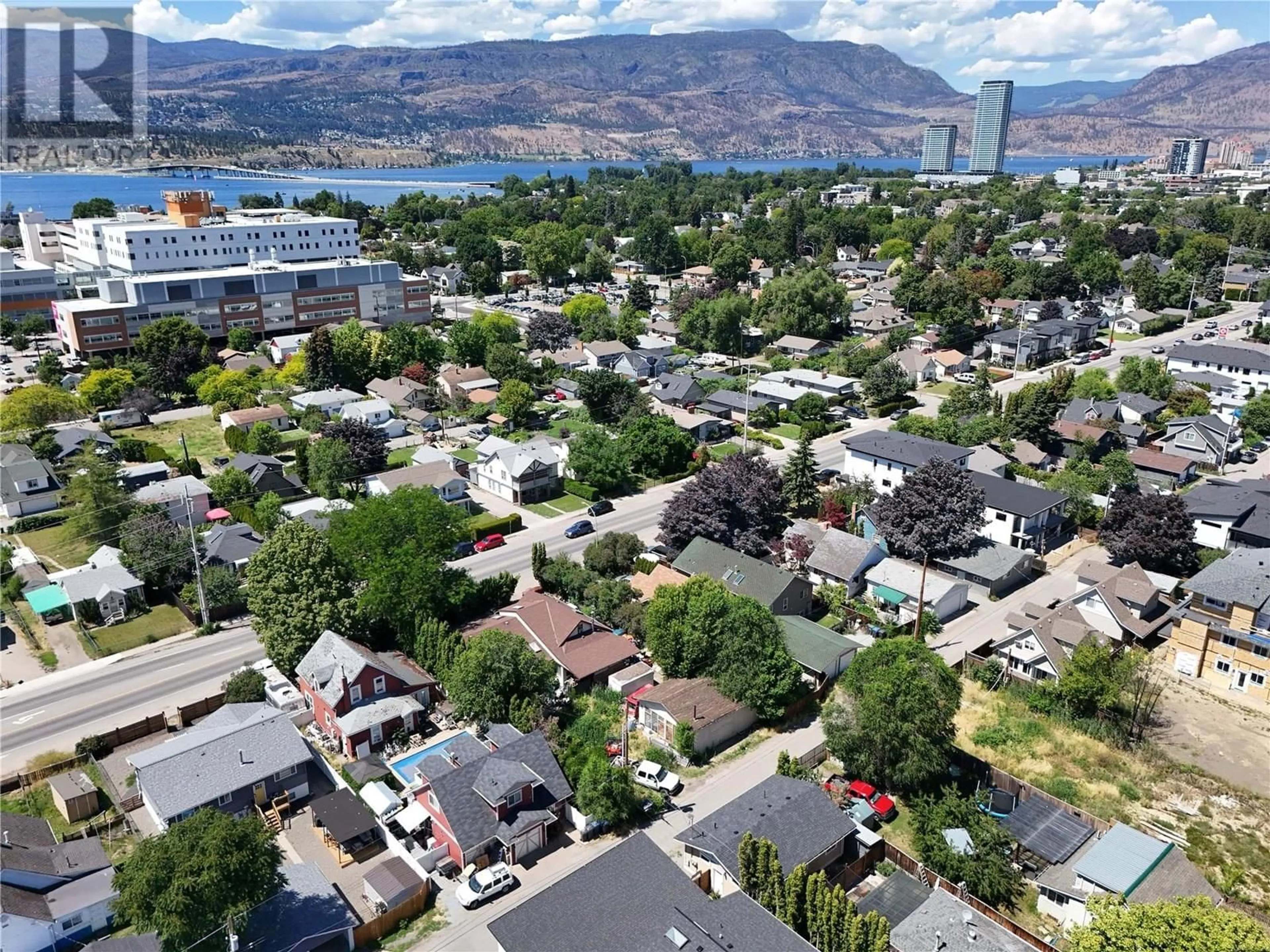 A pic from outside/outdoor area/front of a property/back of a property/a pic from drone, mountain view for 2237 RICHTER STREET, Kelowna British Columbia V1Y2N9