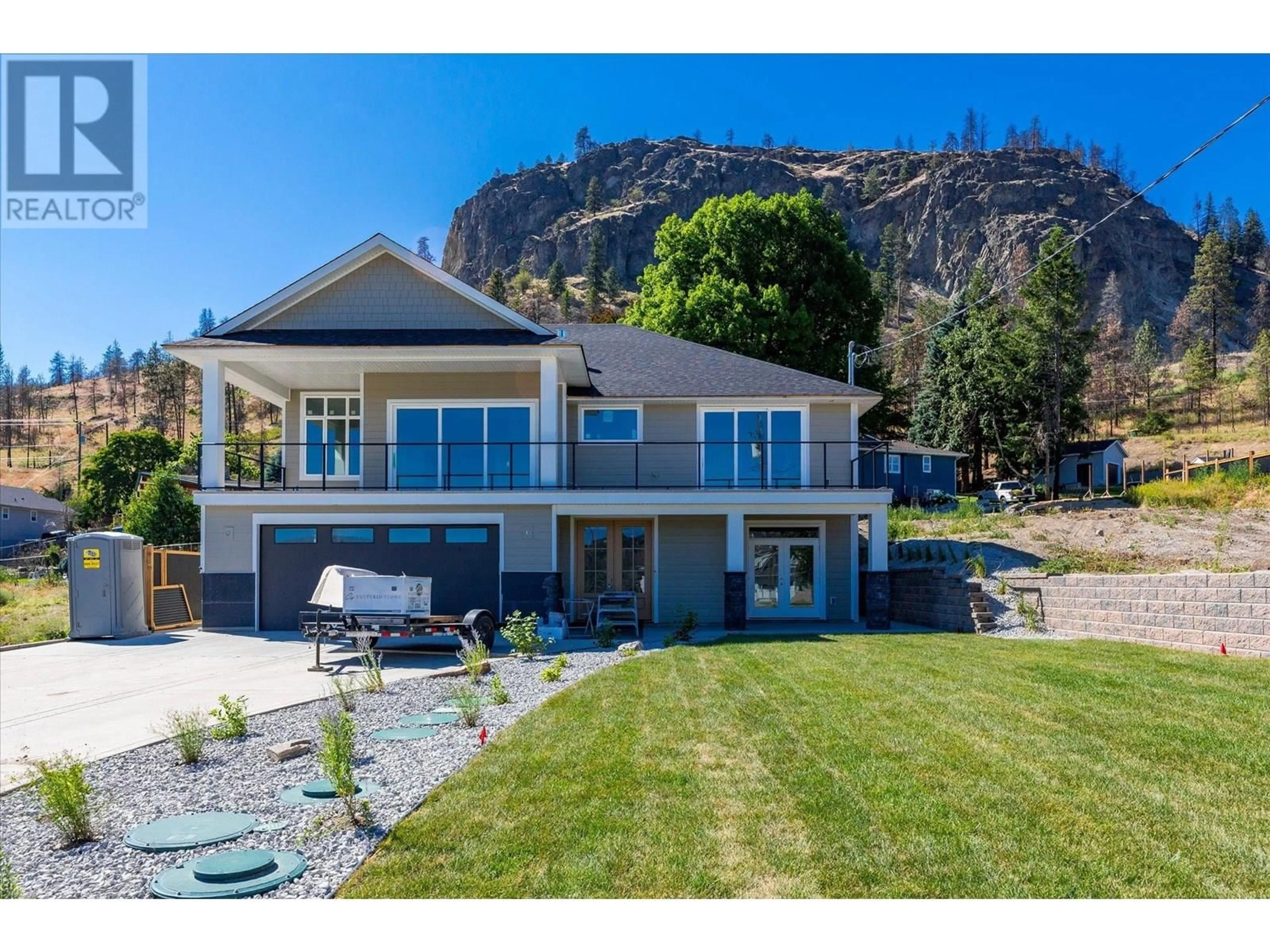 A pic from outside/outdoor area/front of a property/back of a property/a pic from drone, mountain view for 167 HELDON COURT, West Kelowna British Columbia V1Z3S5